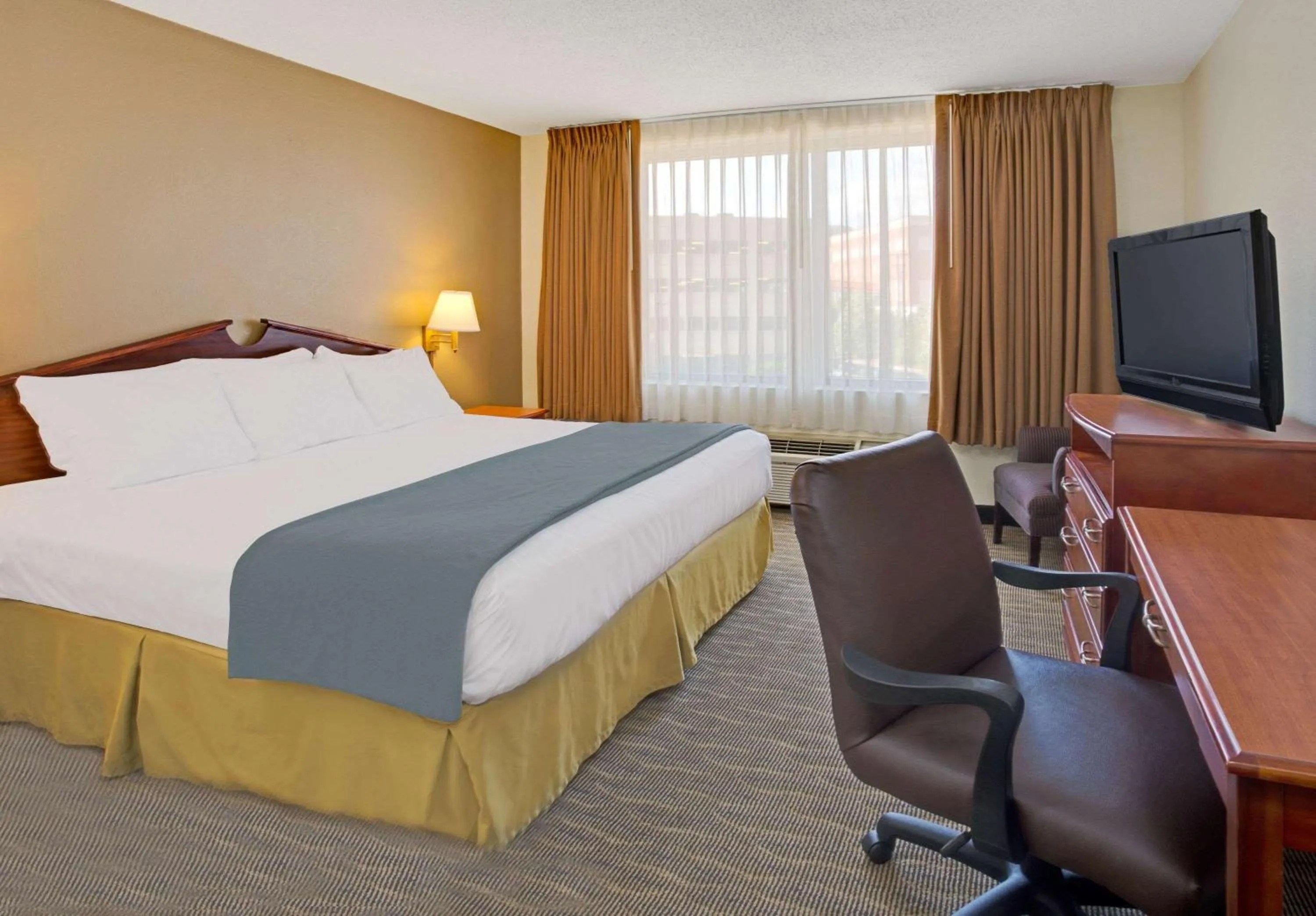 Photo of the whole room, Bed in Days Inn by Wyndham Silver Spring