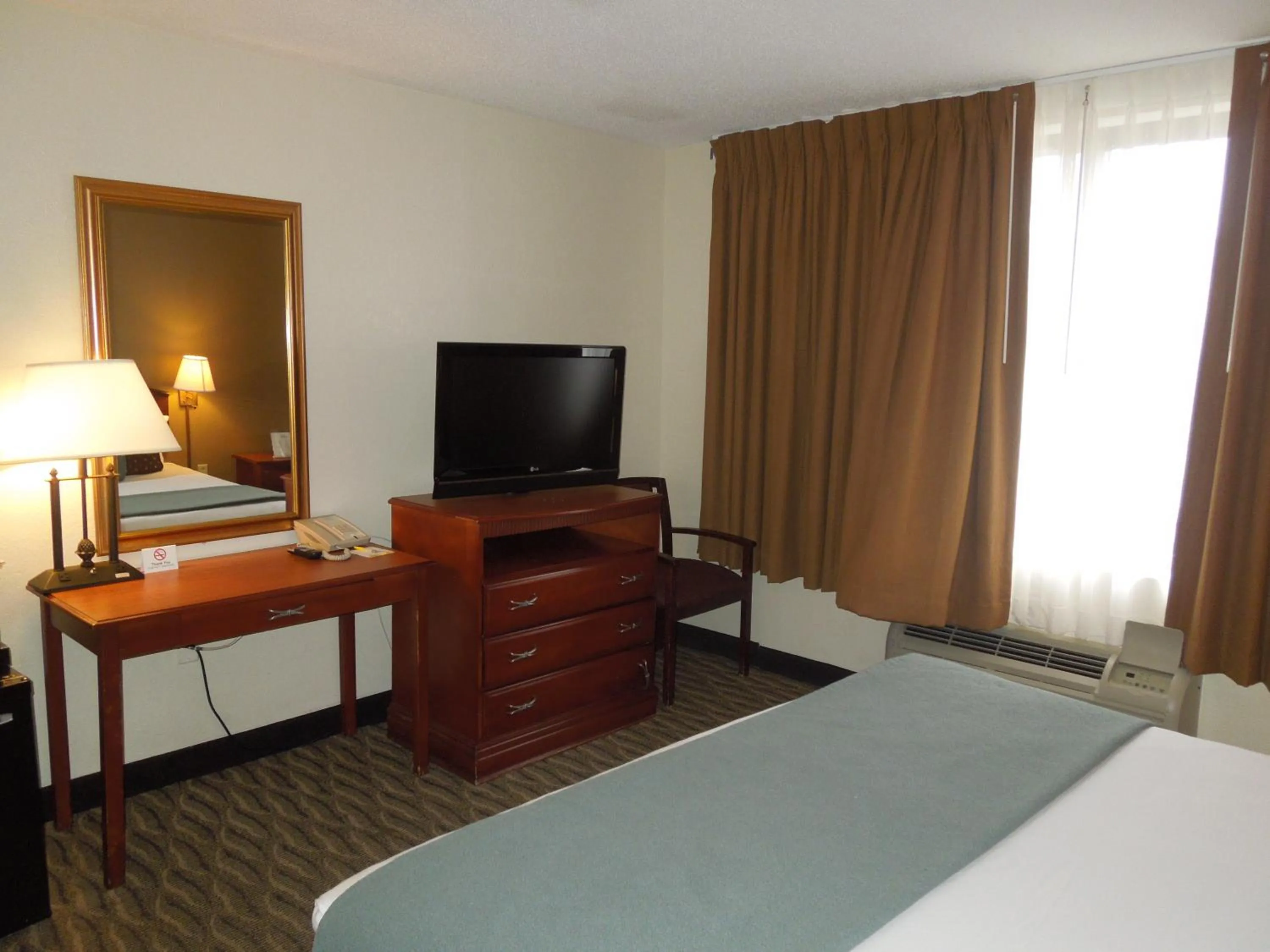 Bedroom, Bed in Days Inn by Wyndham Silver Spring