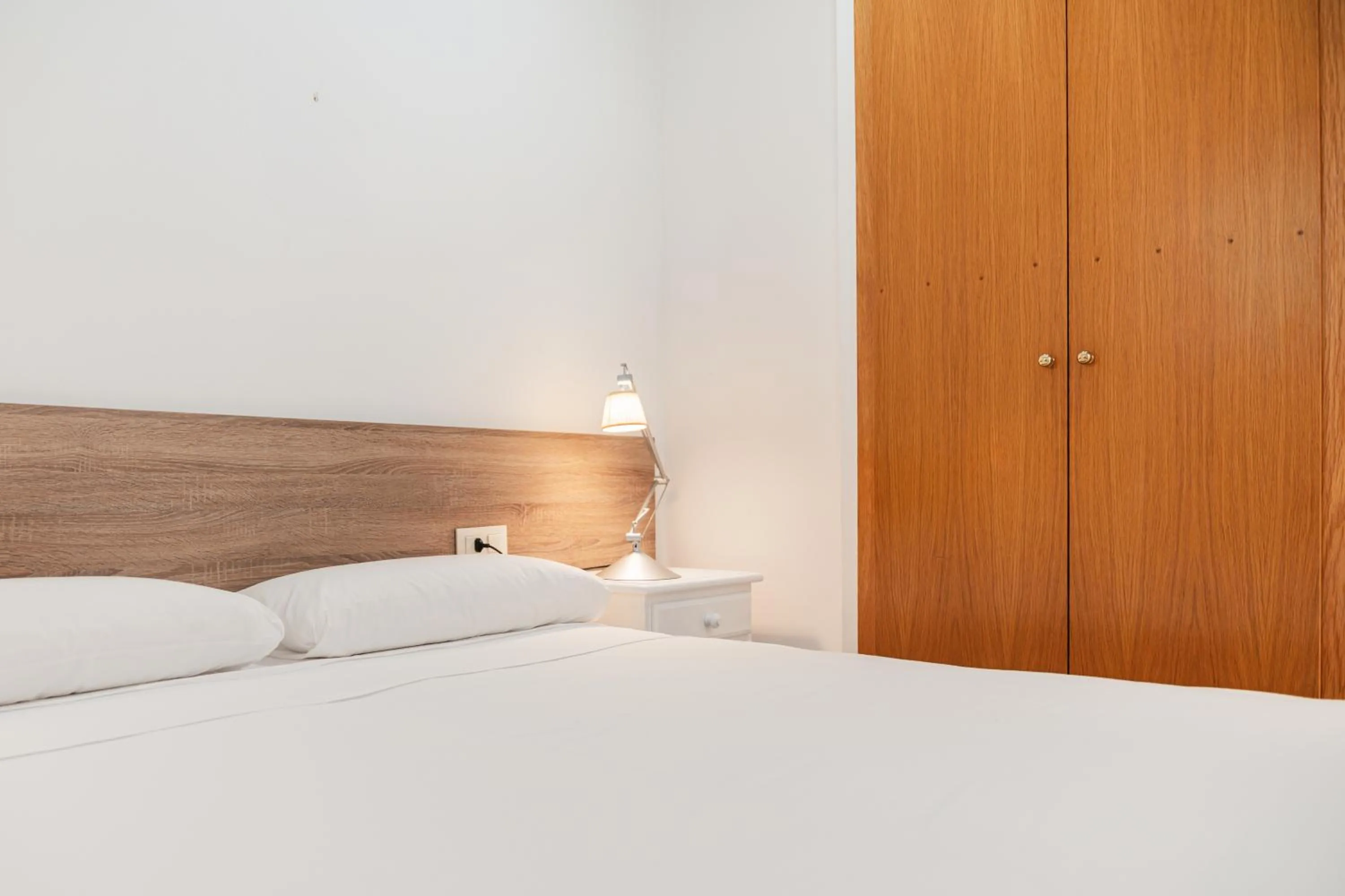 Bed in Santa Llucia Apartaments