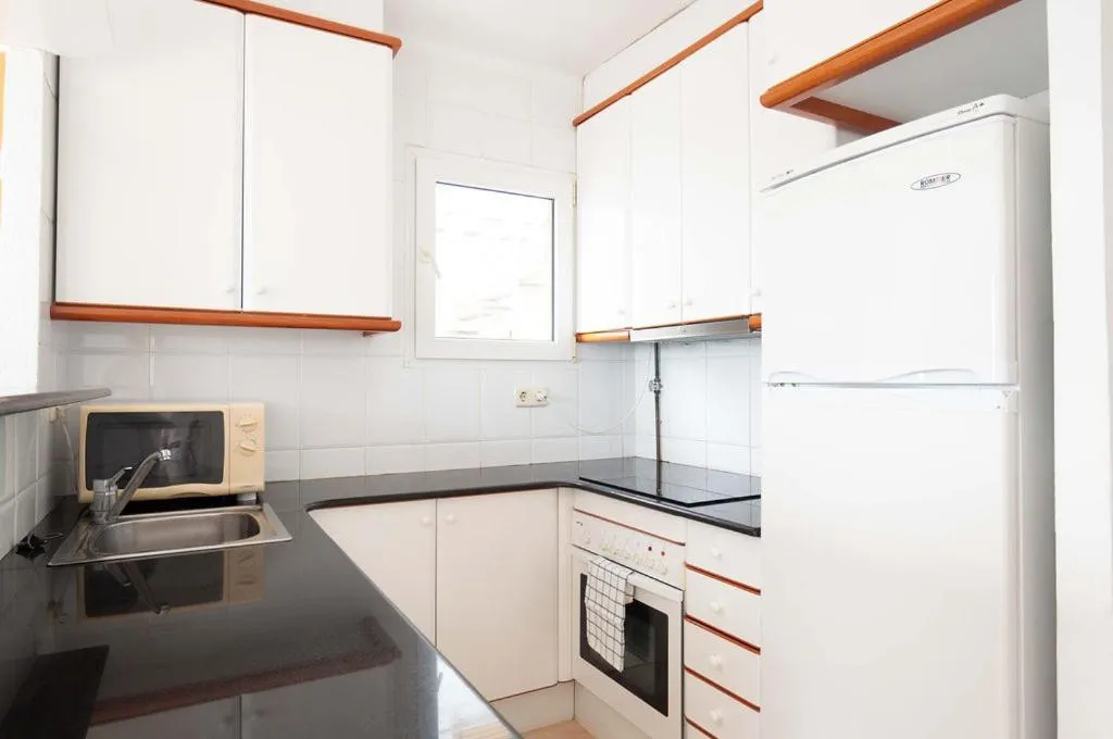 Kitchen or kitchenette in Santa Llucia Apartaments
