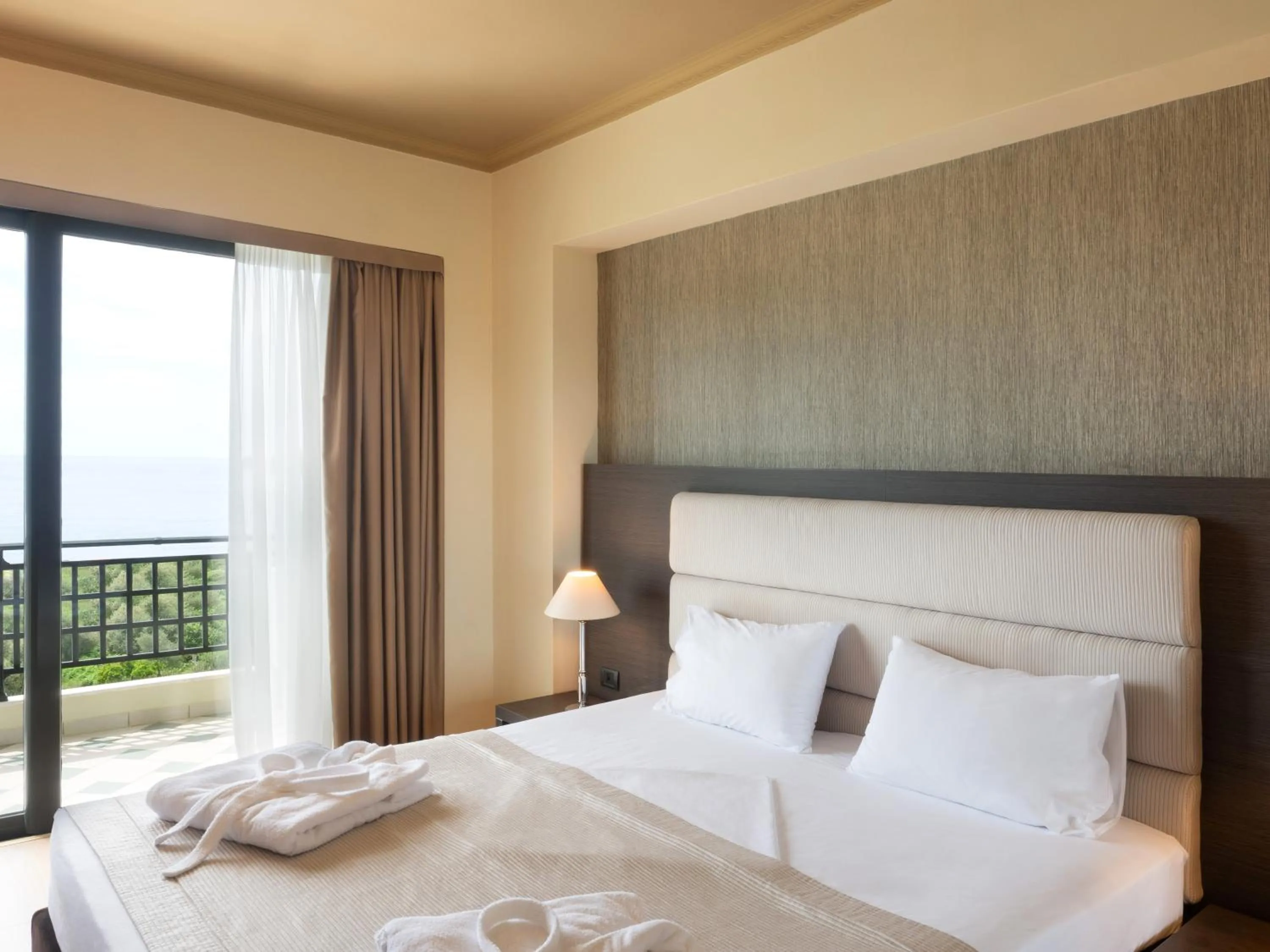 Bed in Rapo's Resort Hotel