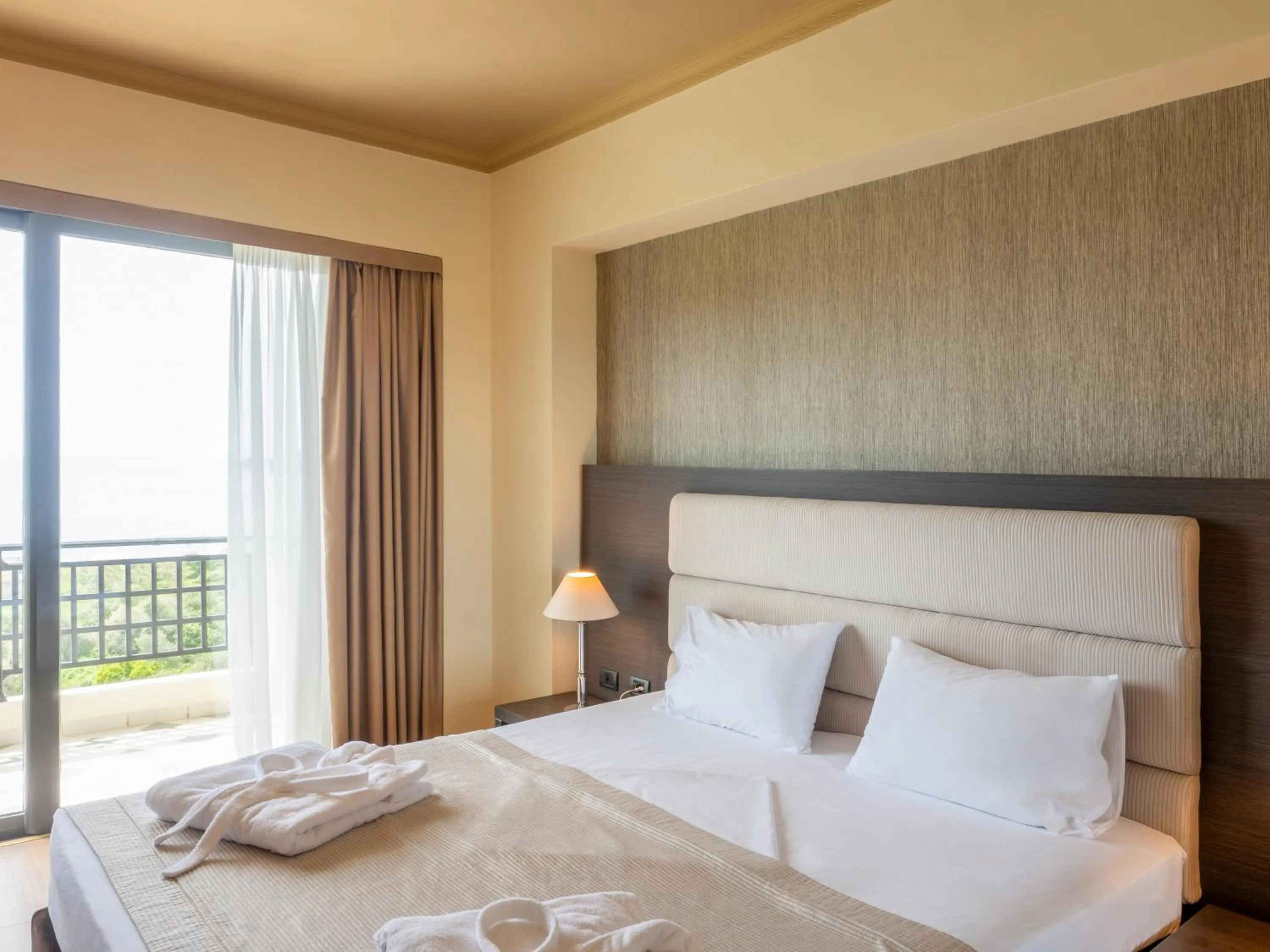 Bed in Rapo's Resort Hotel