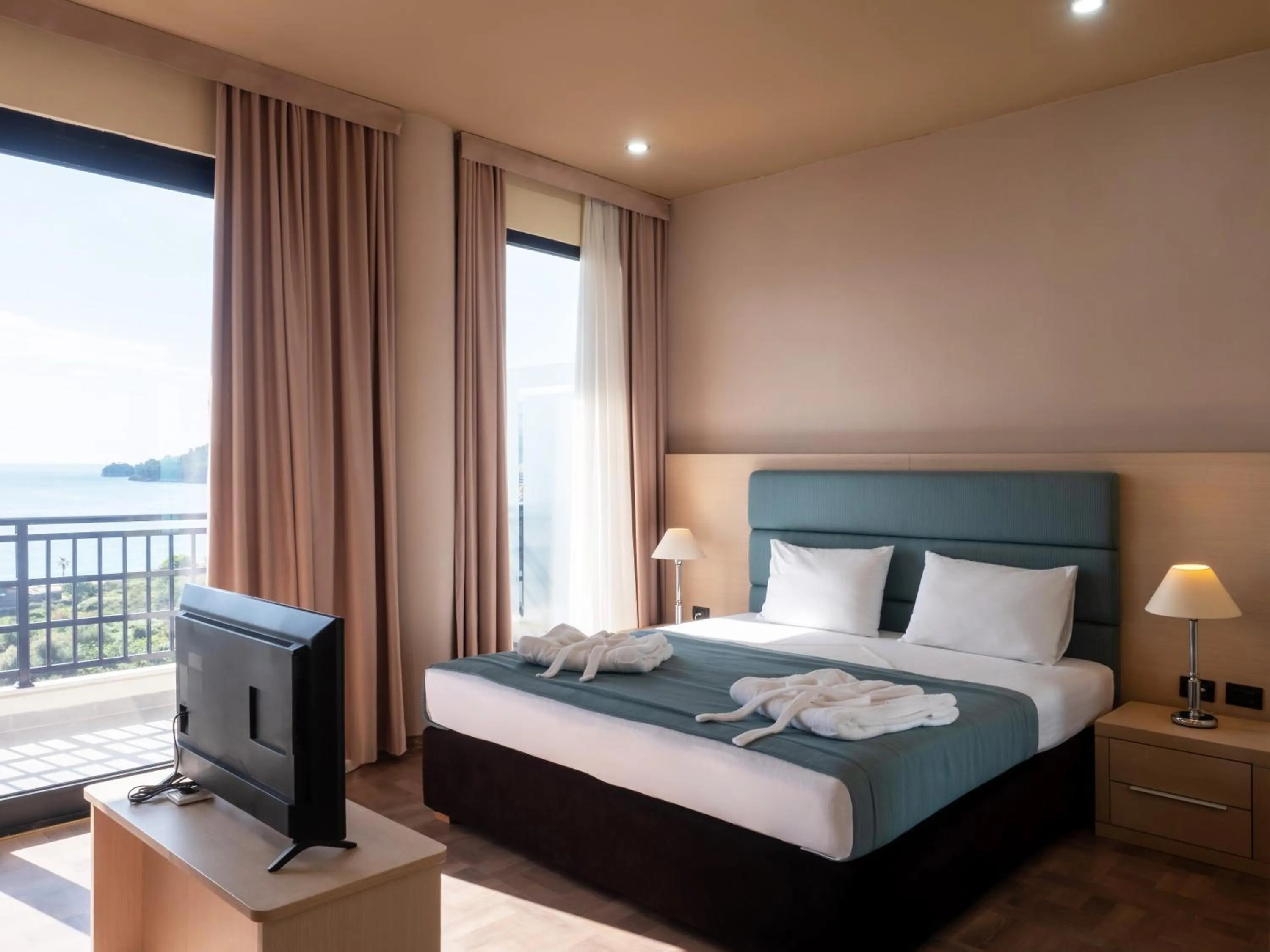 Bed in Rapo's Resort Hotel