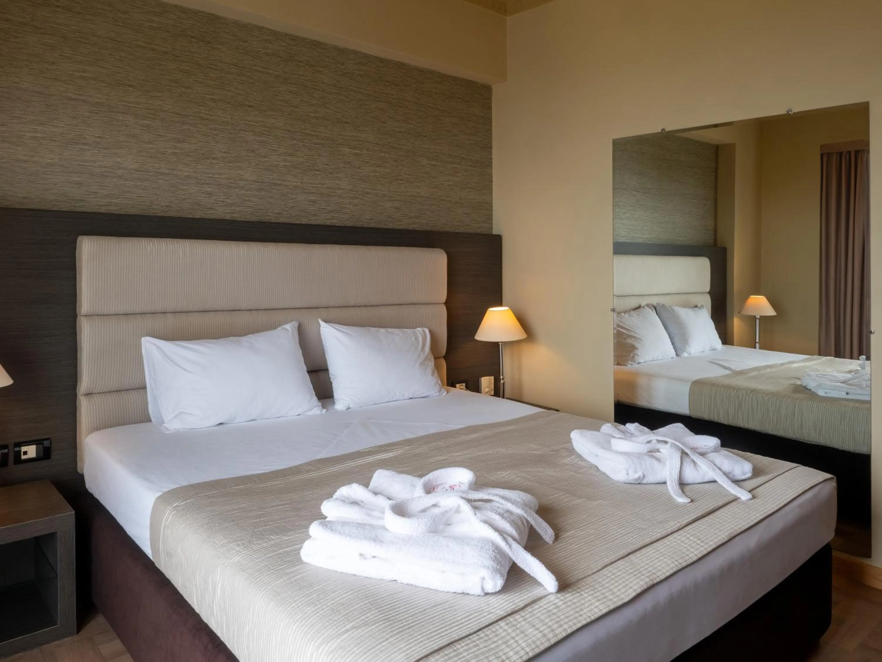 Bed in Rapo's Resort Hotel