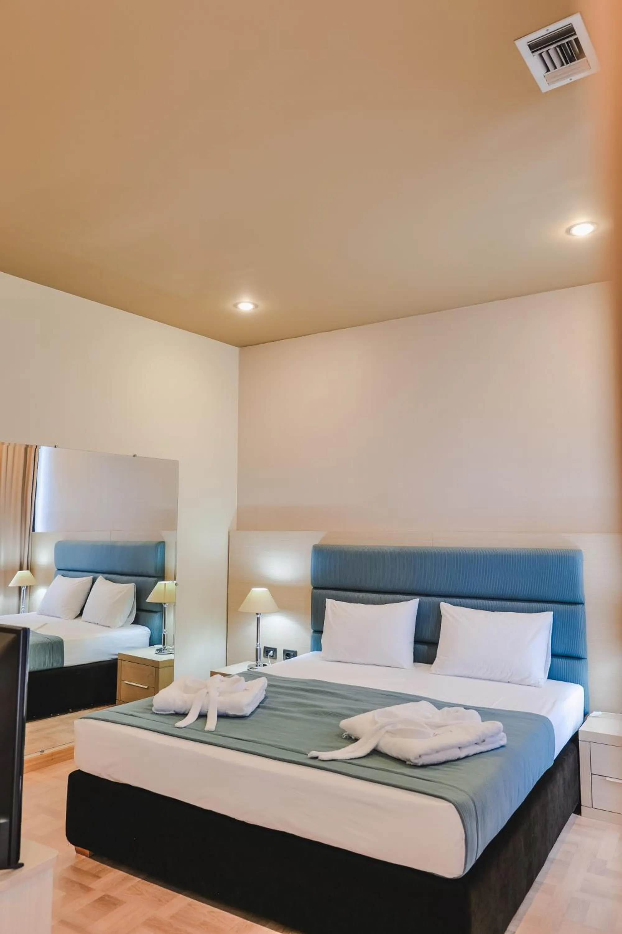 Bed in Rapo's Resort Hotel