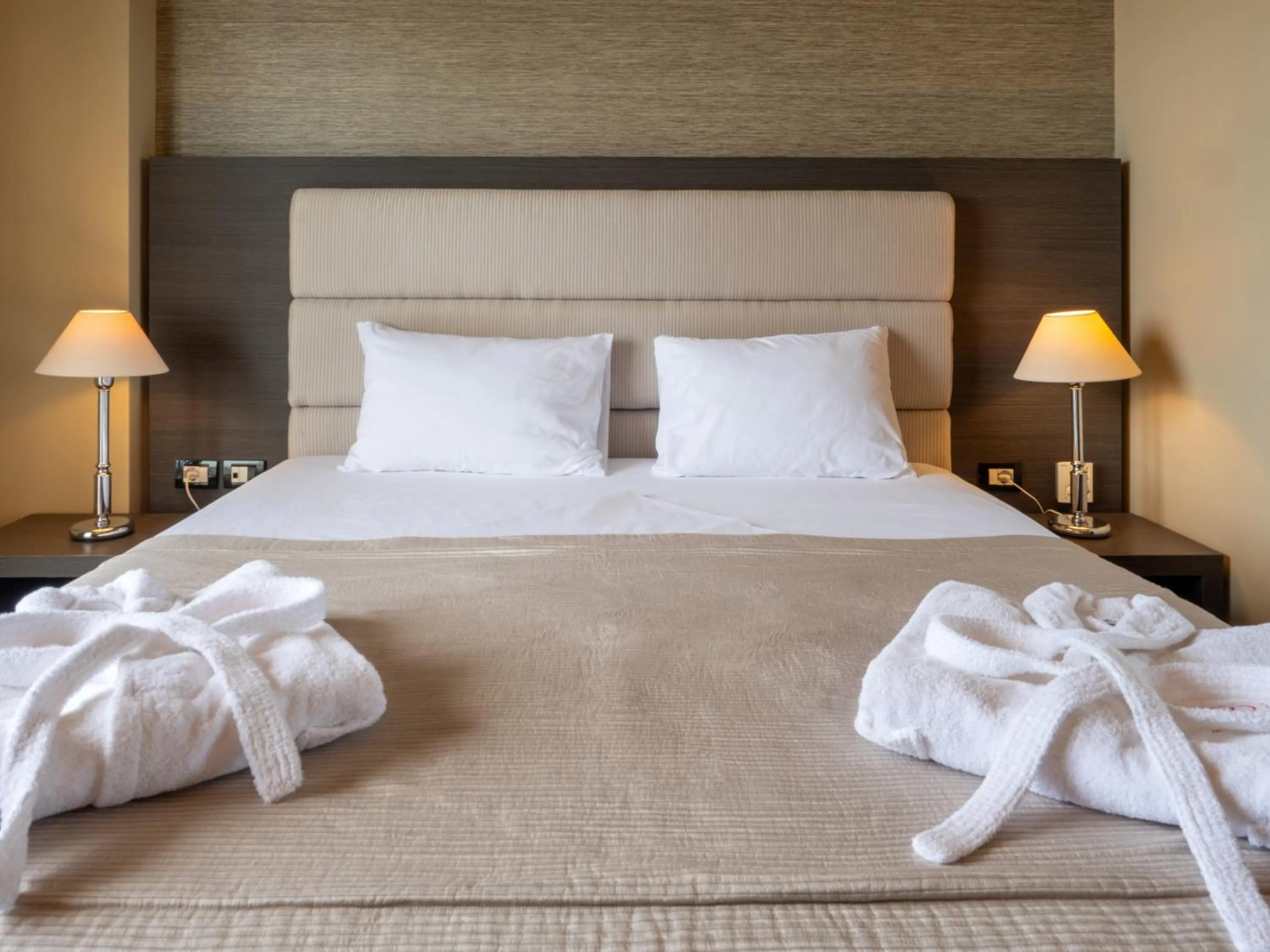 Bed in Rapo's Resort Hotel