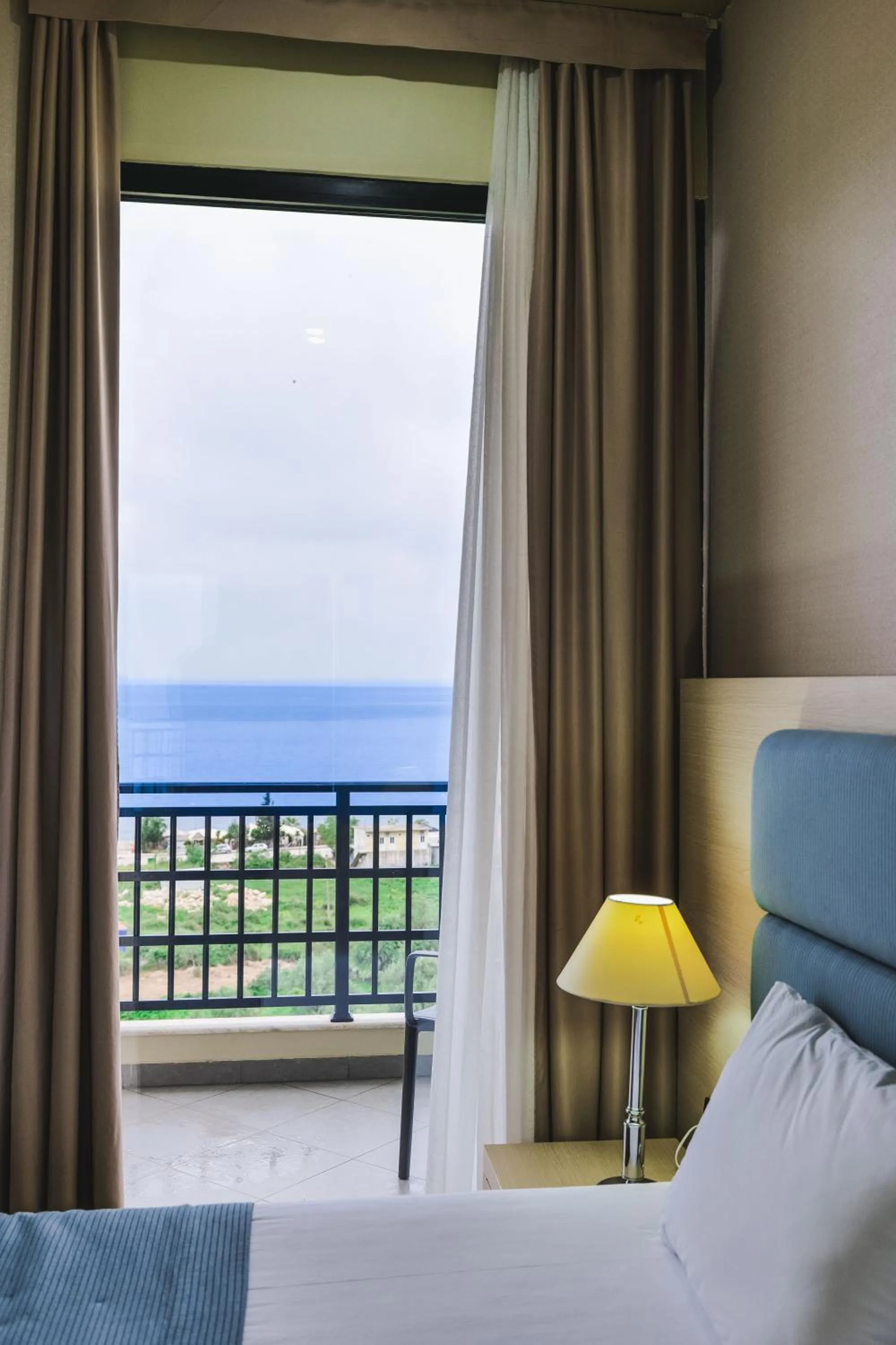 Bed in Rapo's Resort Hotel