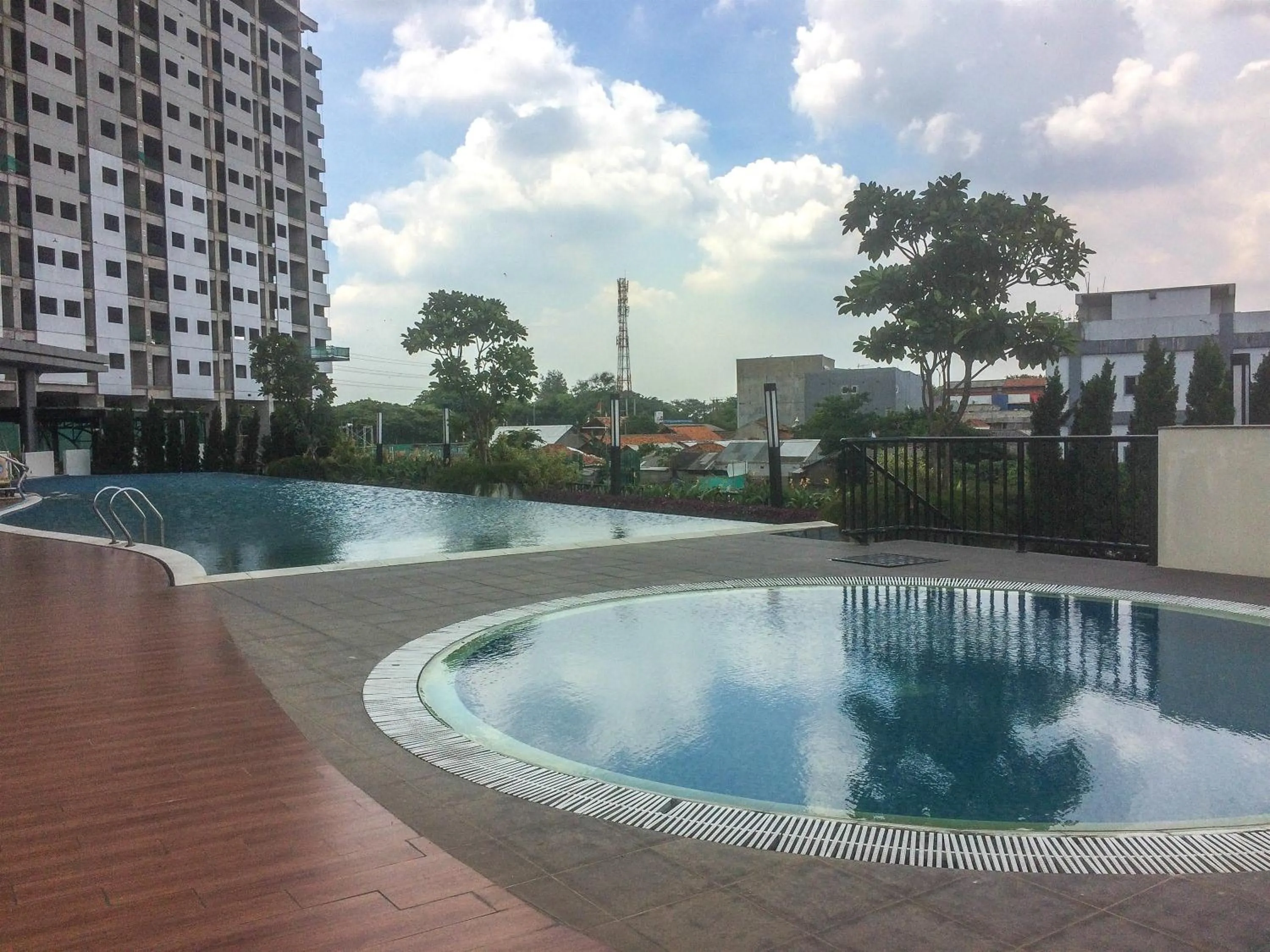 Property building in Best Price 1BR Apartment at The Oasis Cikarang By Travelio