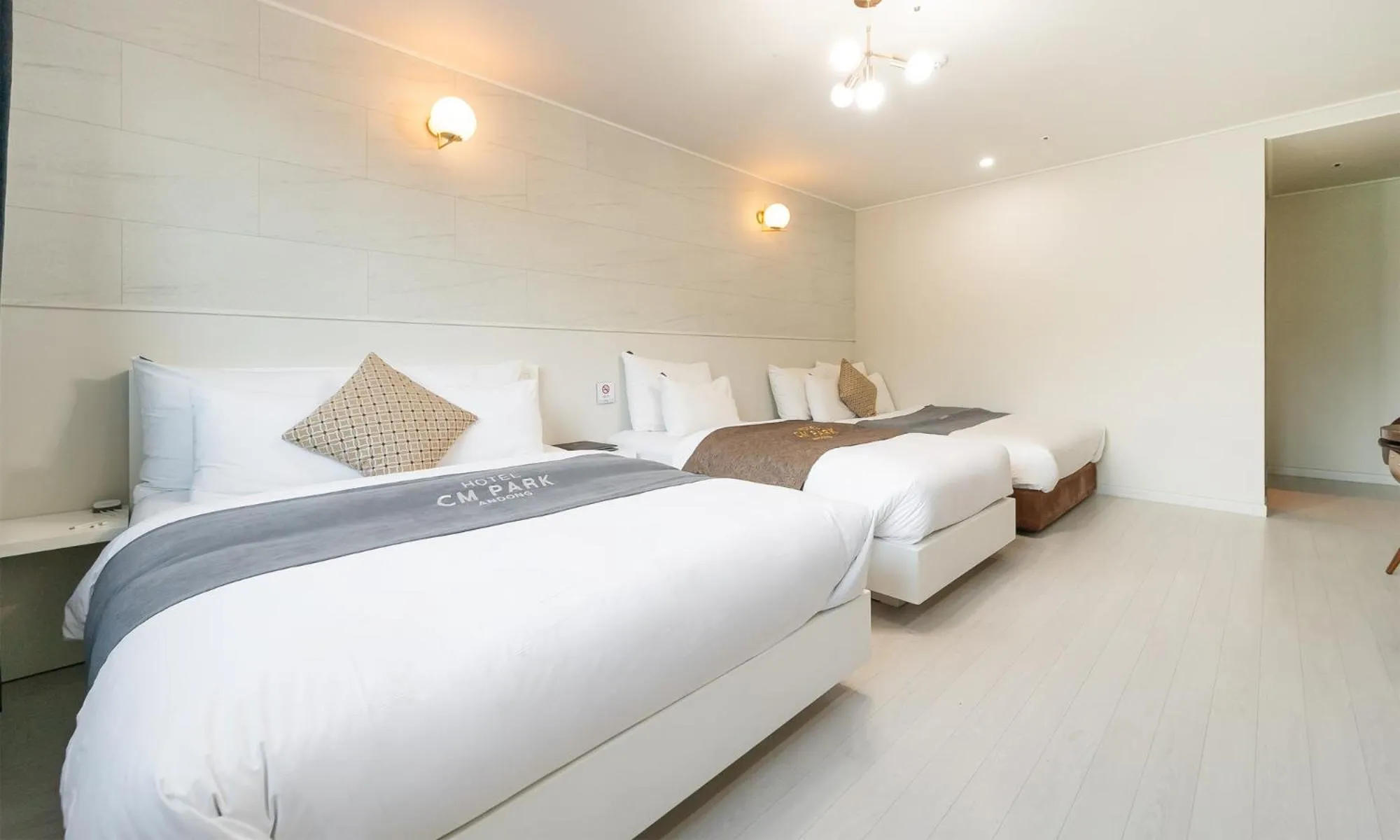 Bed in CM Park Hotel