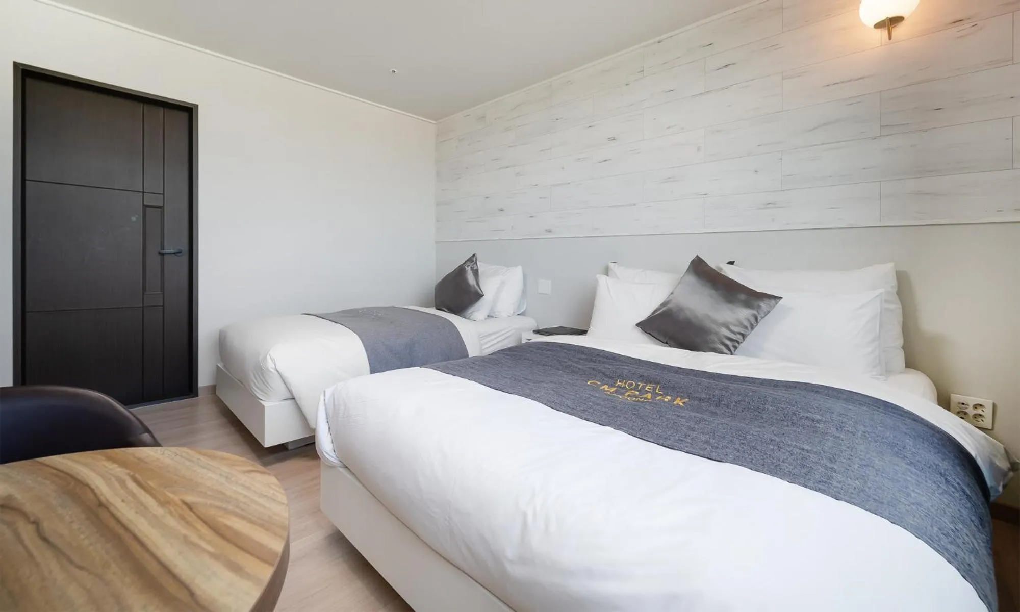 Bed in CM Park Hotel