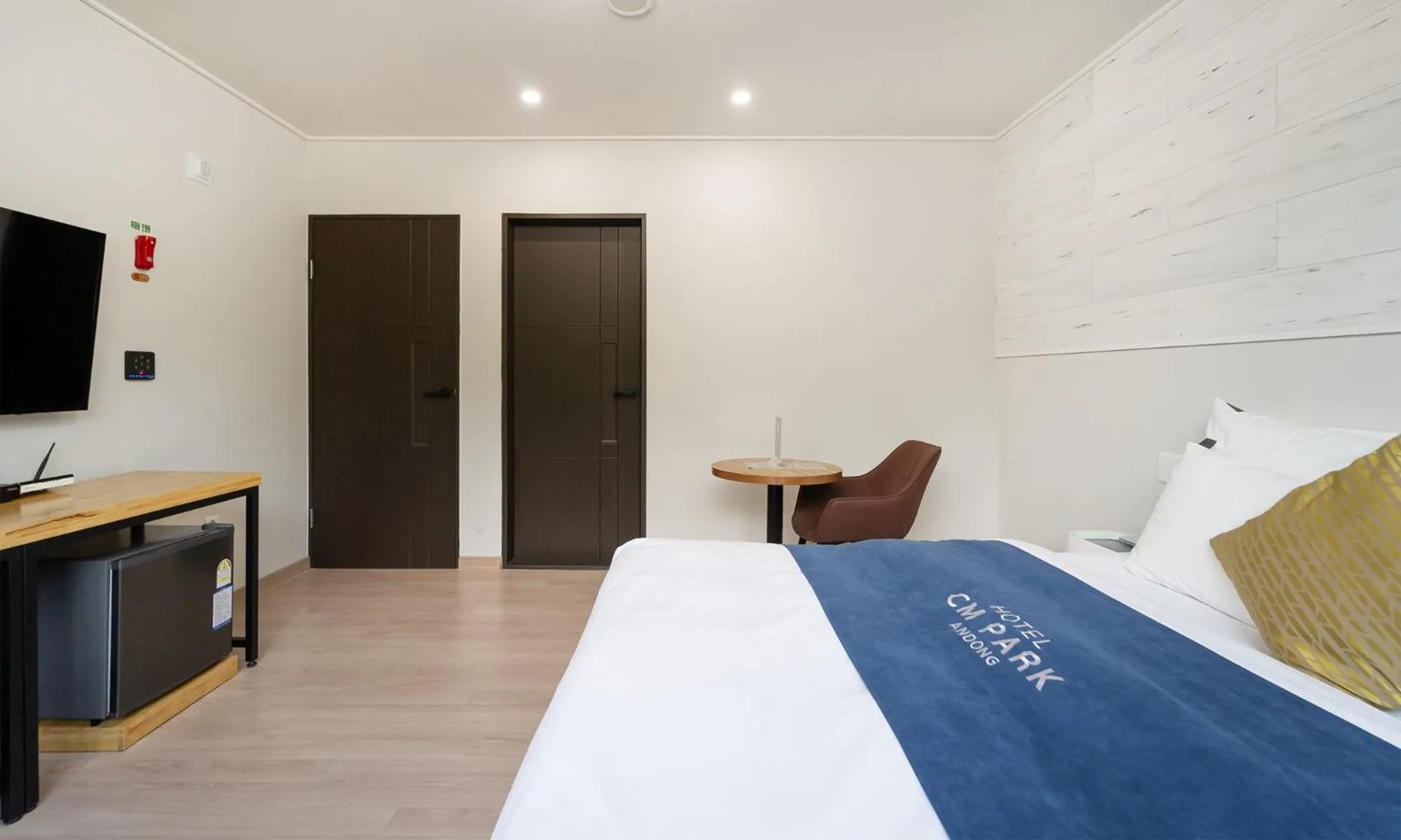 Bed in CM Park Hotel