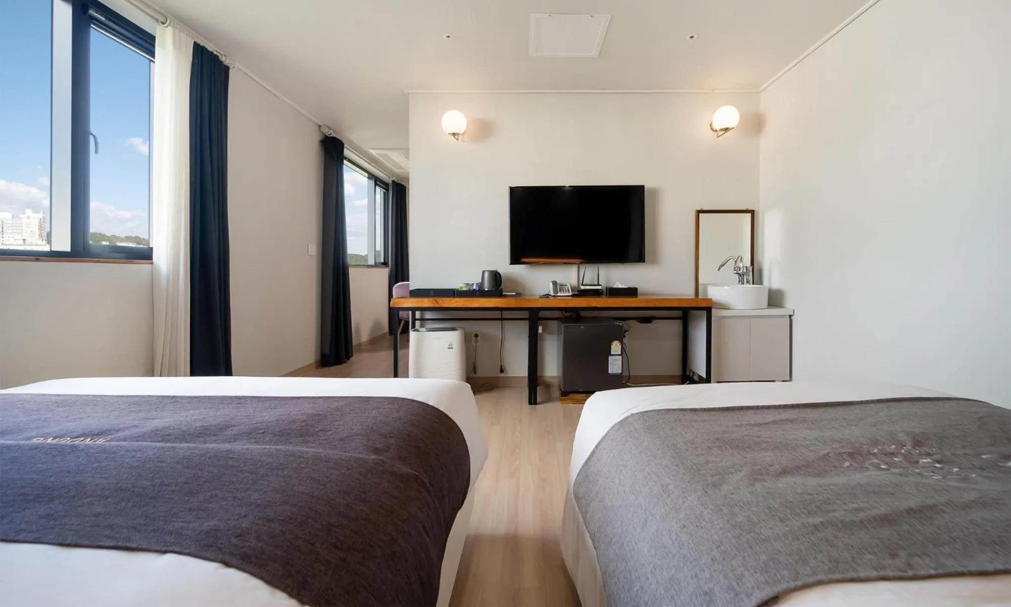 Bed in CM Park Hotel