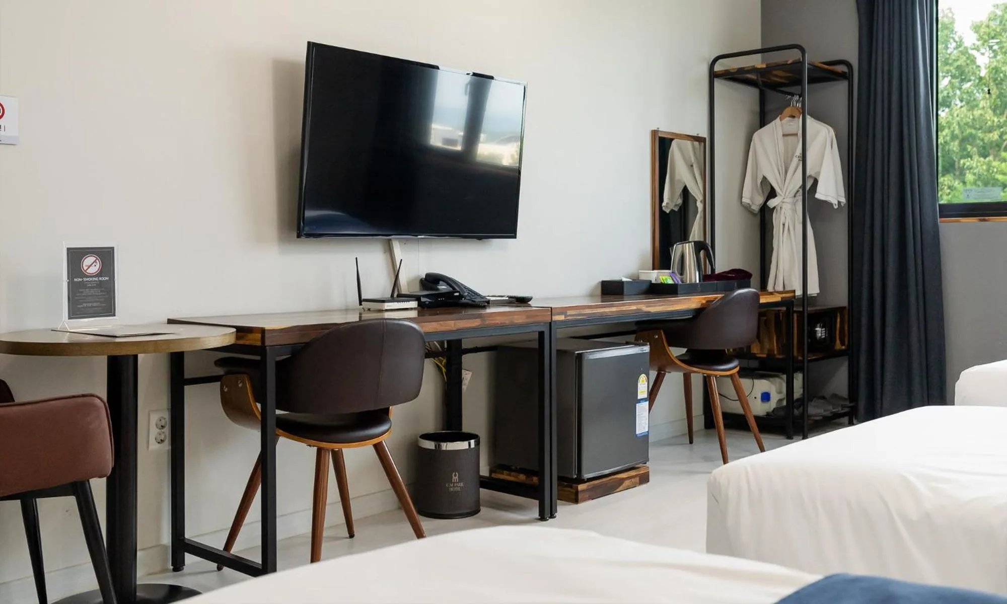 Bed in CM Park Hotel