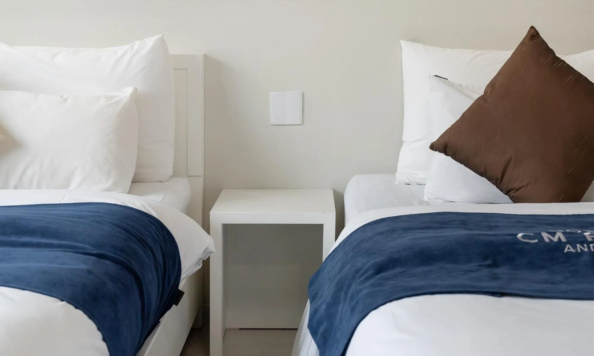 Bed in CM Park Hotel