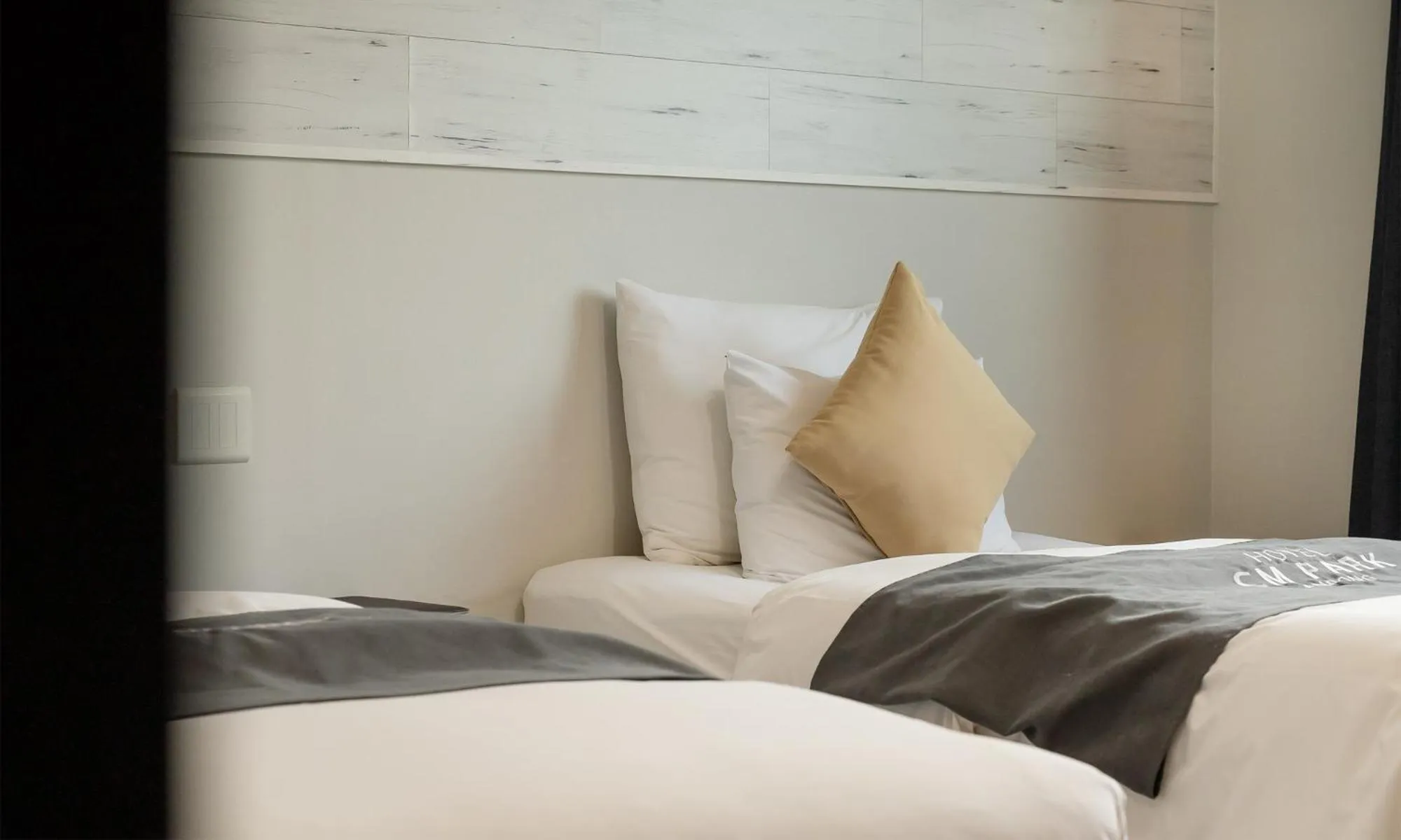 Bed in CM Park Hotel