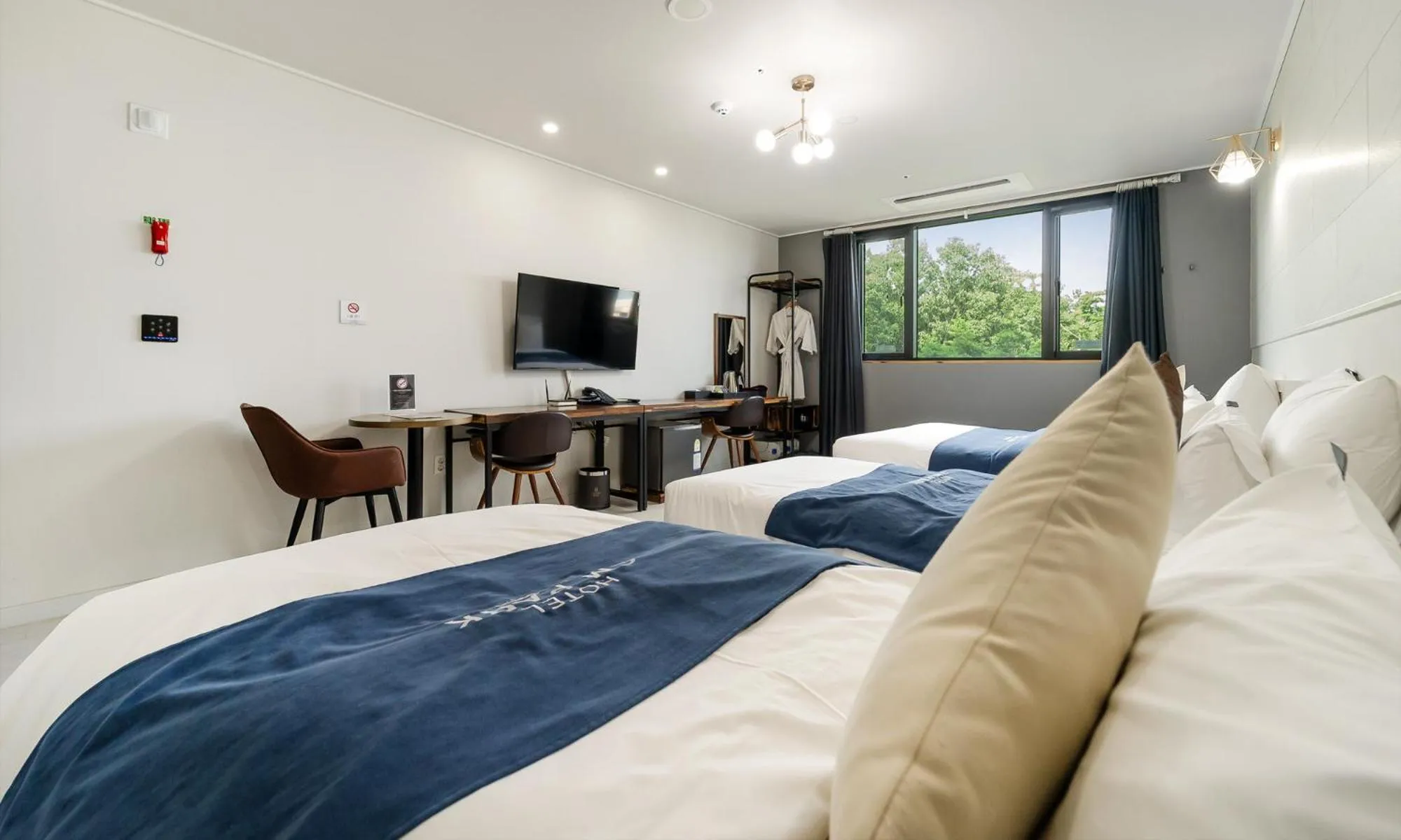 Bed in CM Park Hotel