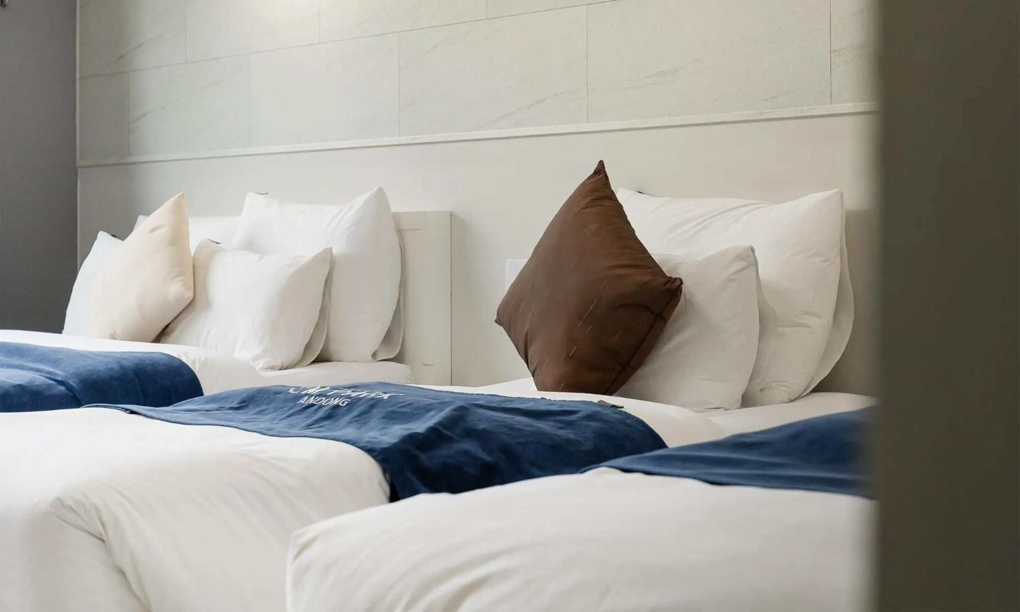 Bed in CM Park Hotel