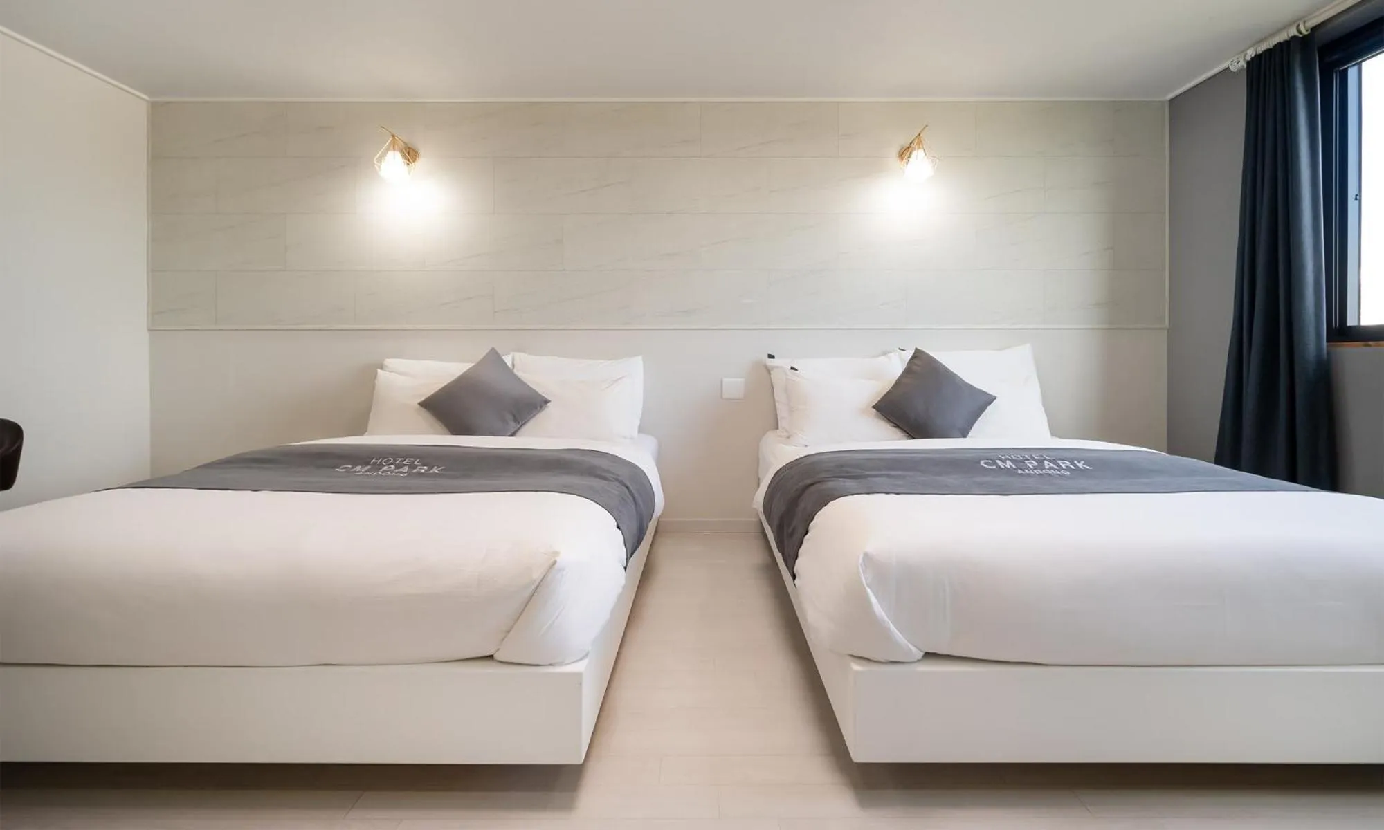 Bed in CM Park Hotel