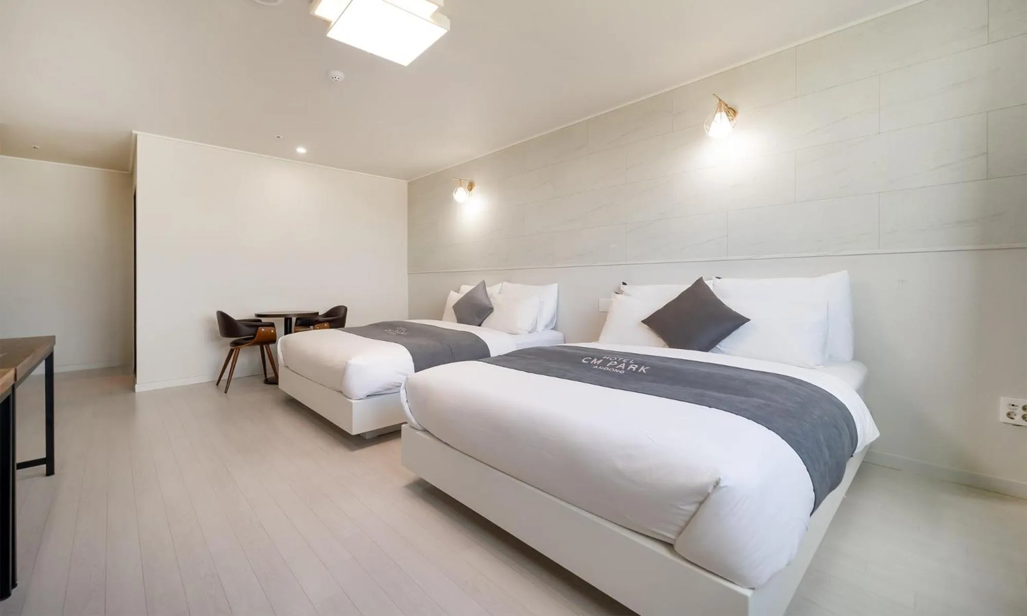 Bed in CM Park Hotel