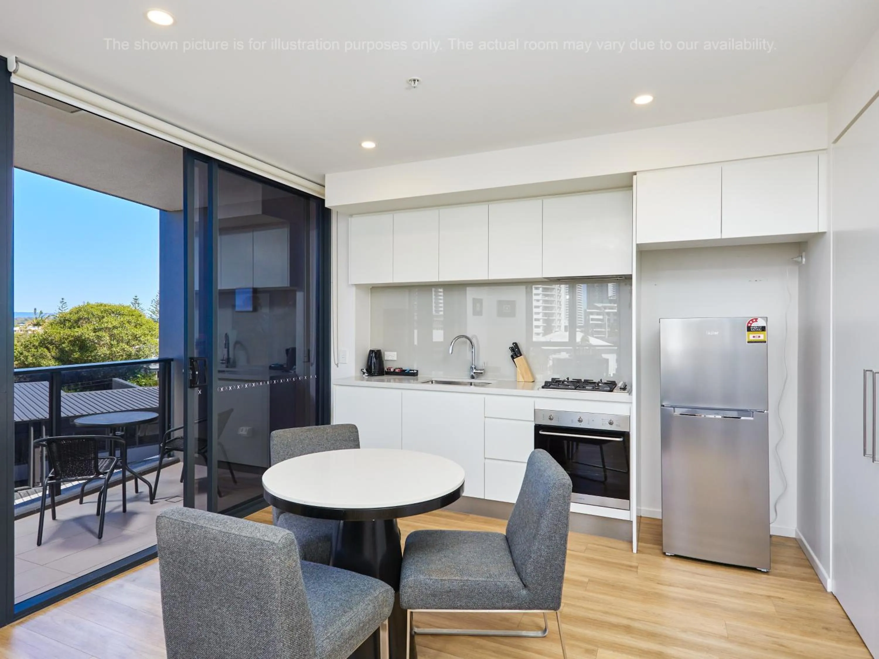 Kitchen or kitchenette in Ruby Gold Coast By Serain