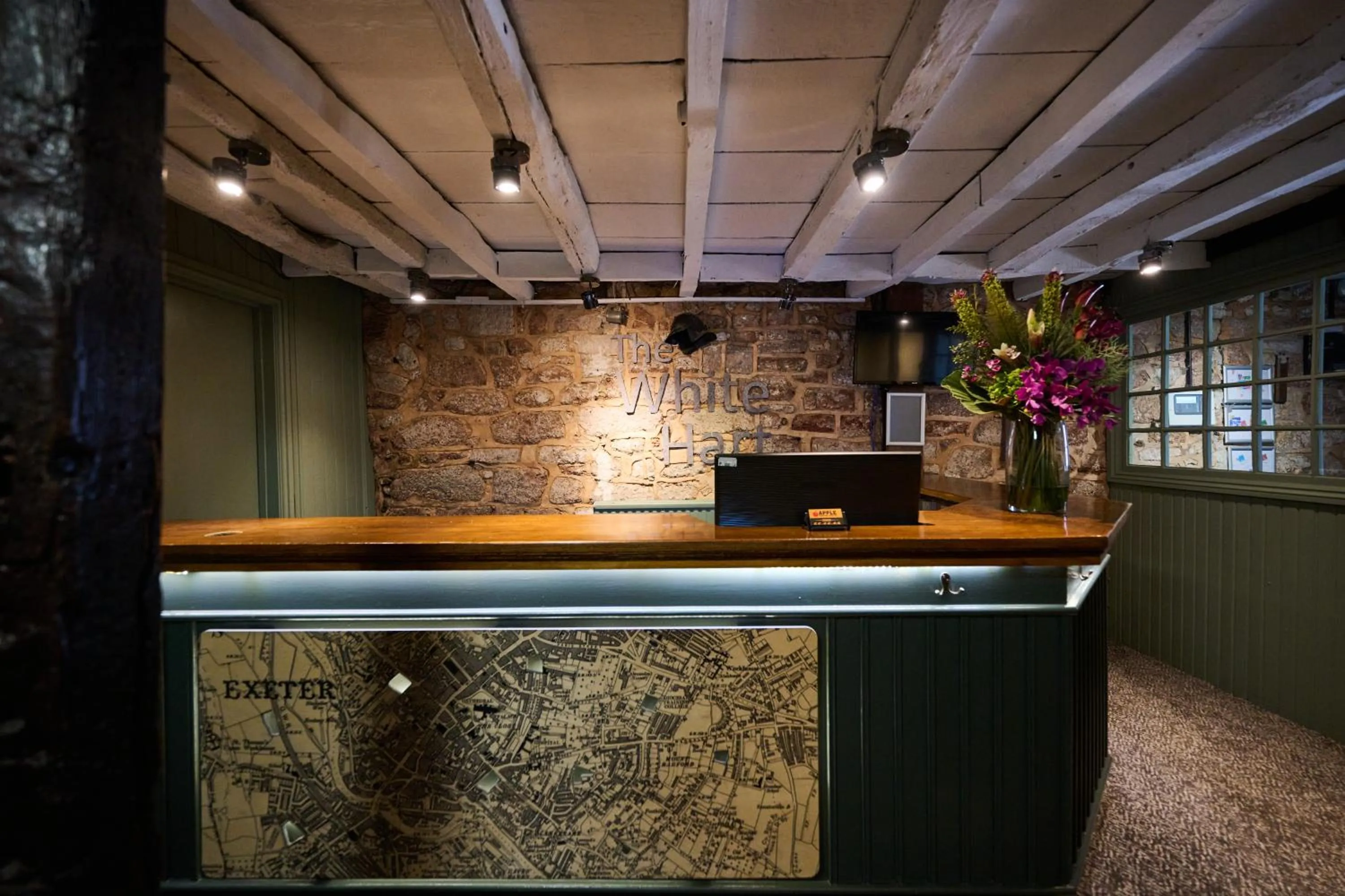 Lobby or reception in White Hart, Exeter by Marston's Inns