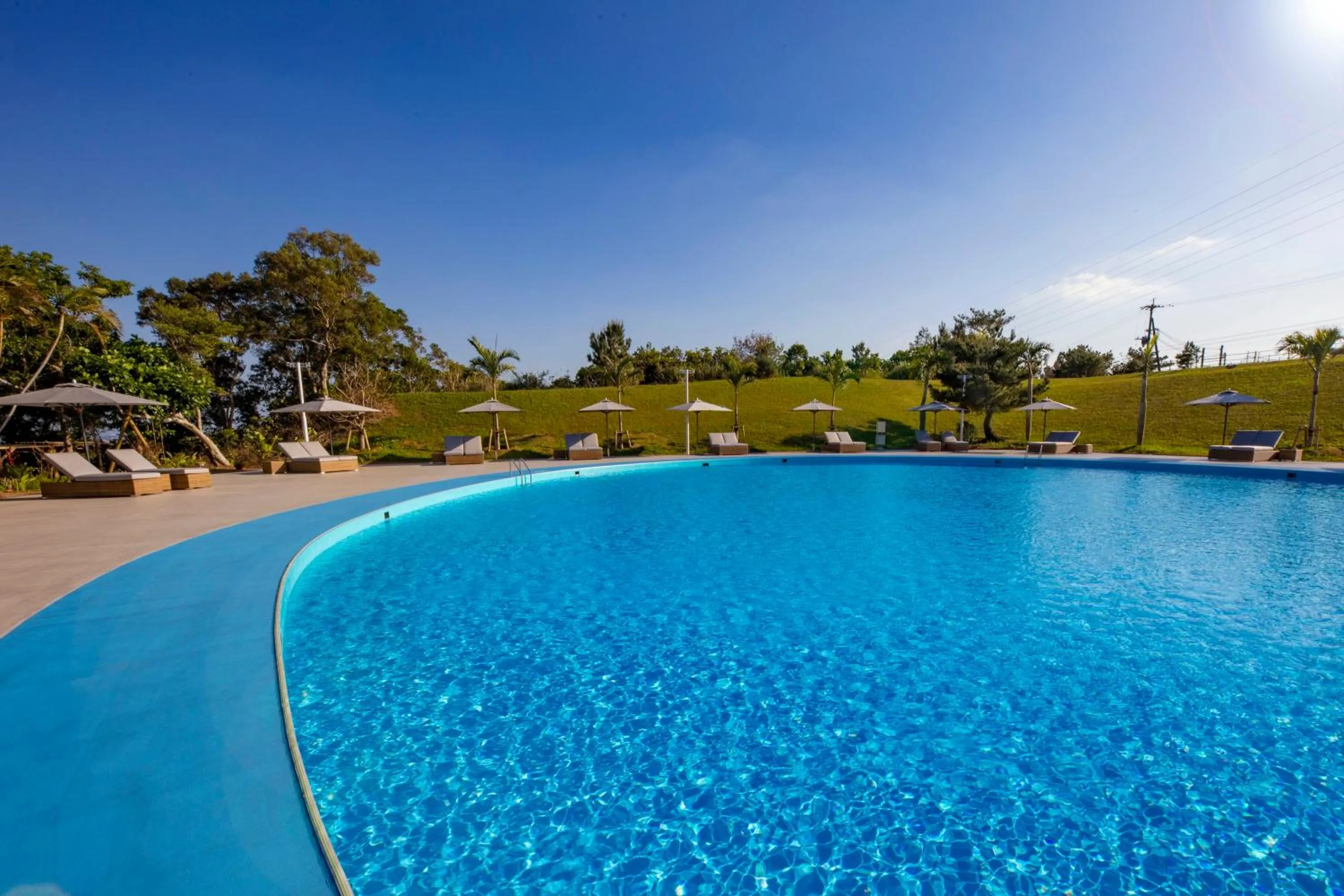 Pool view in ANA Crowne Plaza Resort Okinawa Uruma Hills By IHG