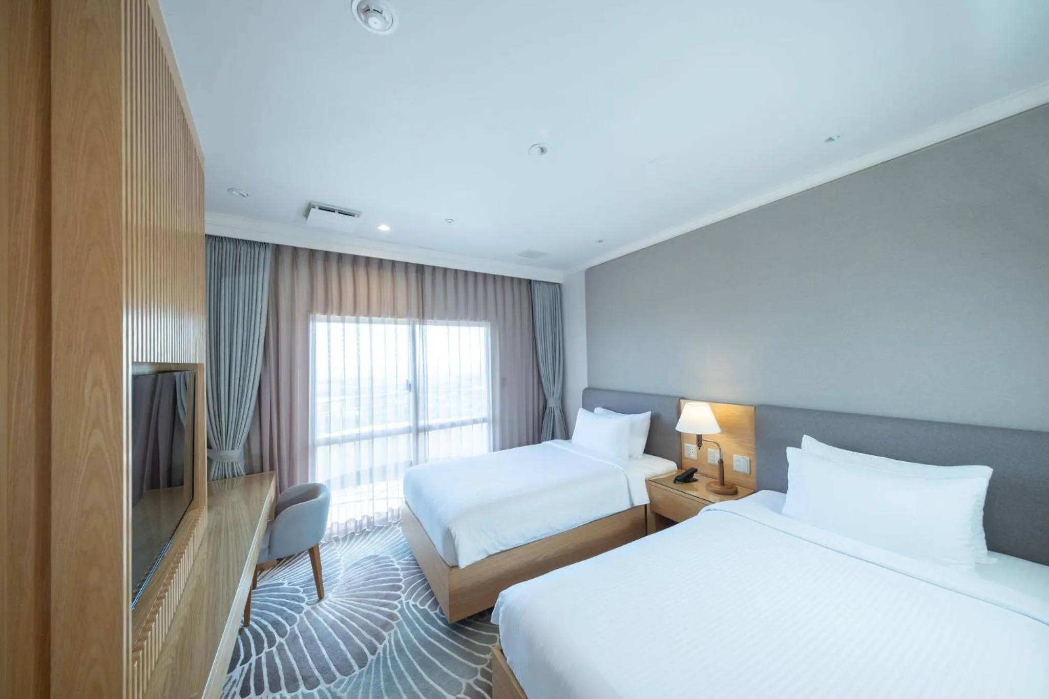 Photo of the whole room, Bed in ANA Crowne Plaza Resort Okinawa Uruma Hills By IHG