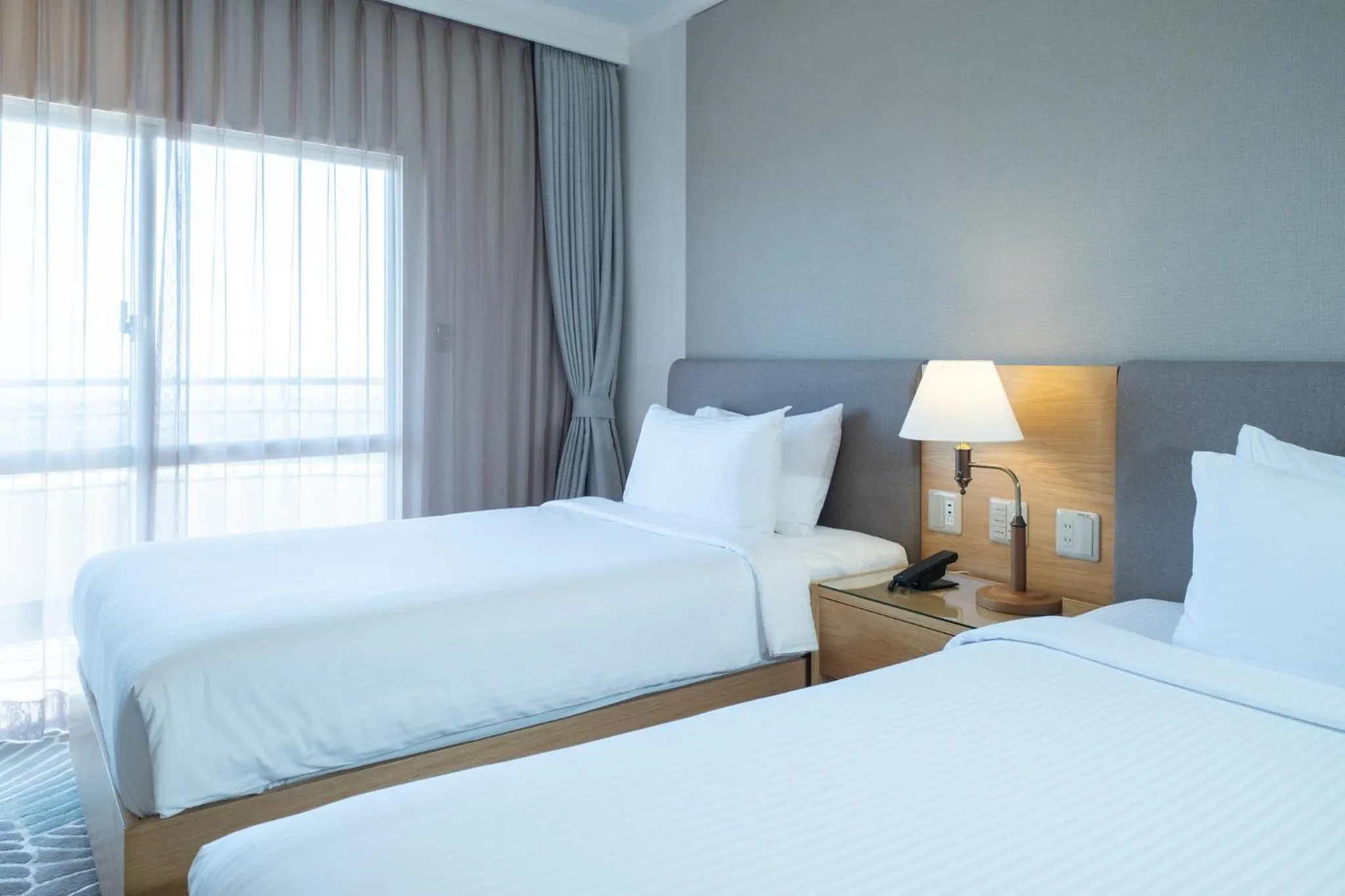 Photo of the whole room, Bed in ANA Crowne Plaza Resort Okinawa Uruma Hills By IHG