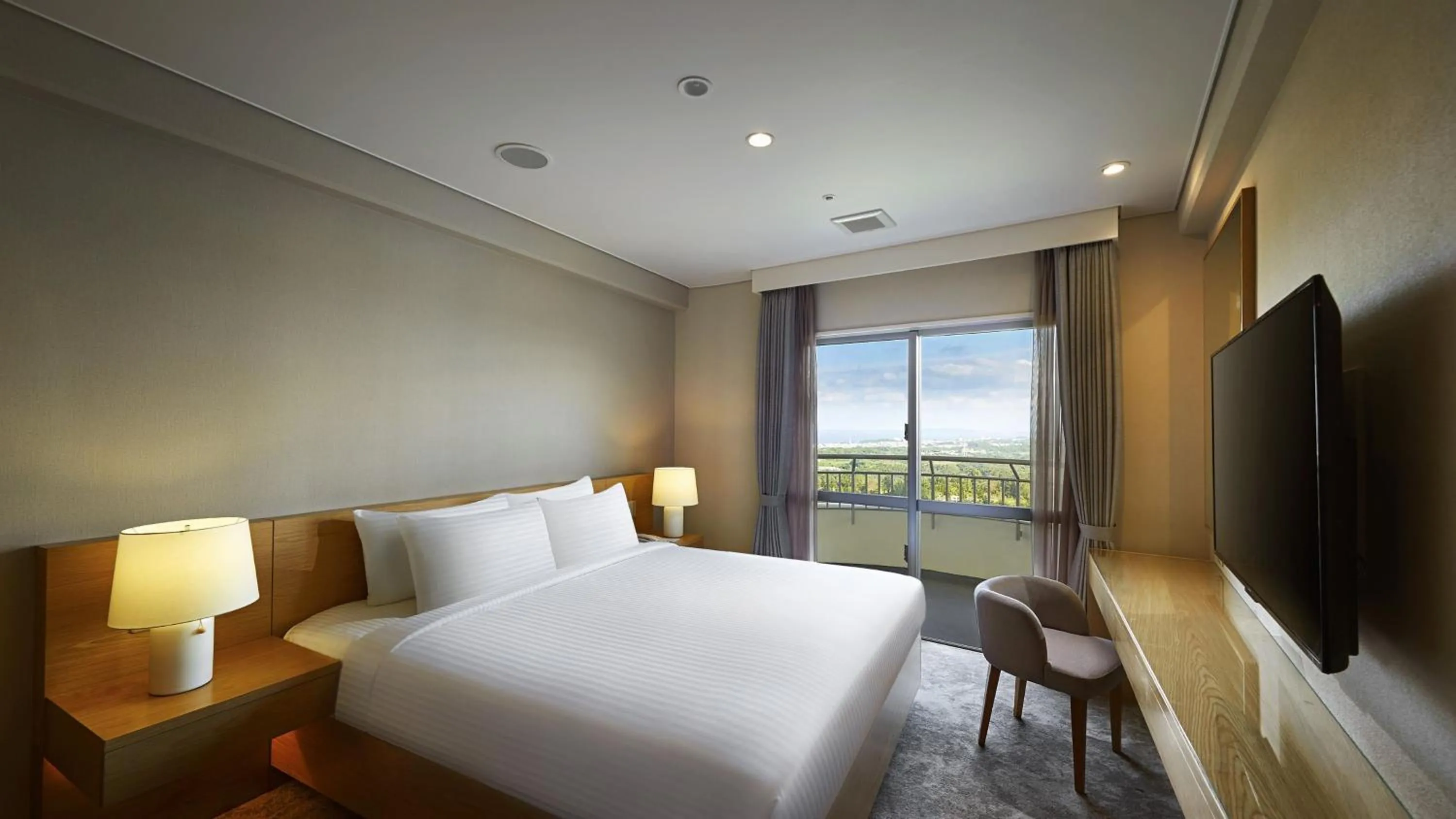 Photo of the whole room, Bed in ANA Crowne Plaza Resort Okinawa Uruma Hills By IHG