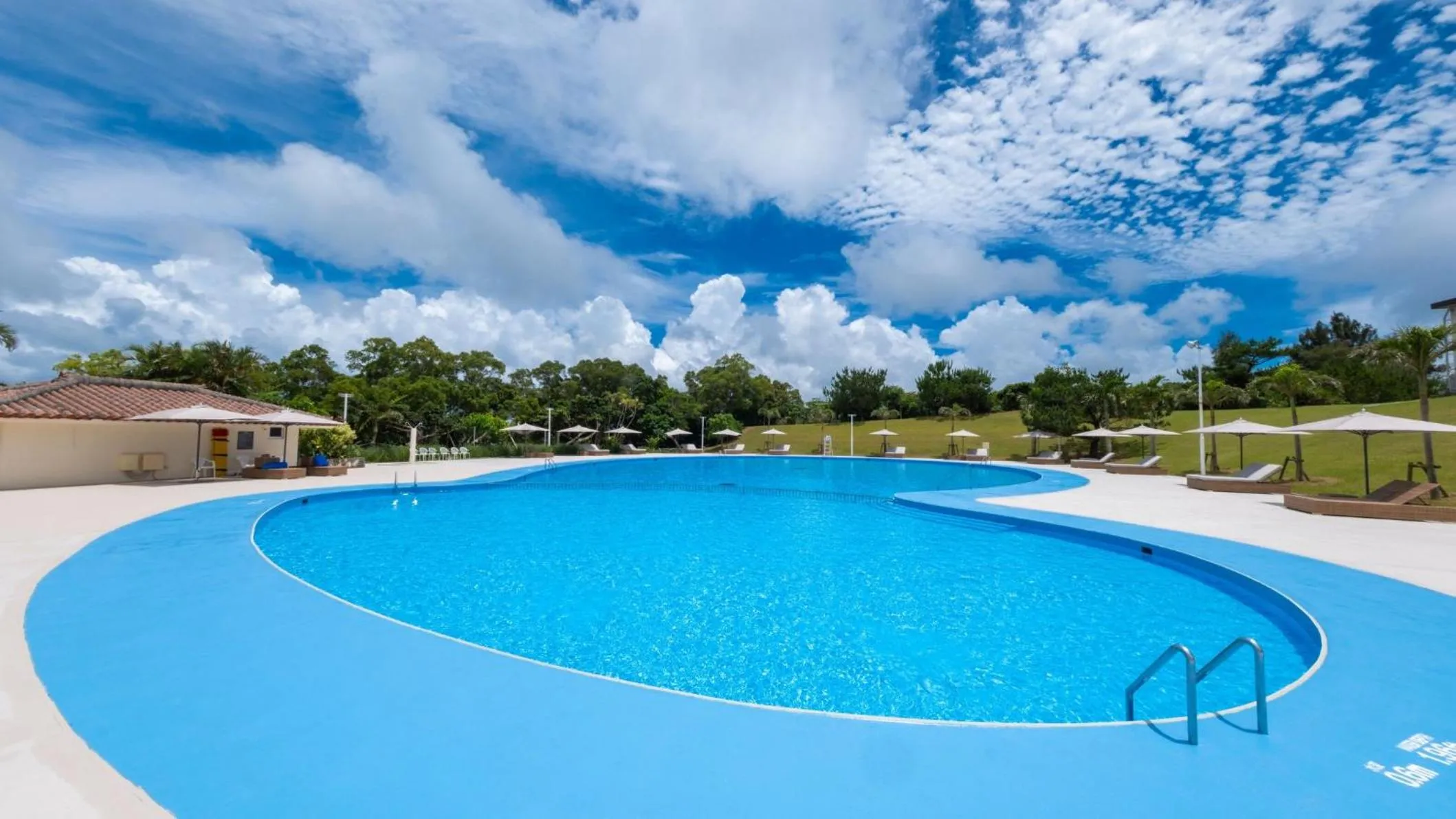 Swimming pool in ANA Crowne Plaza Resort Okinawa Uruma Hills By IHG