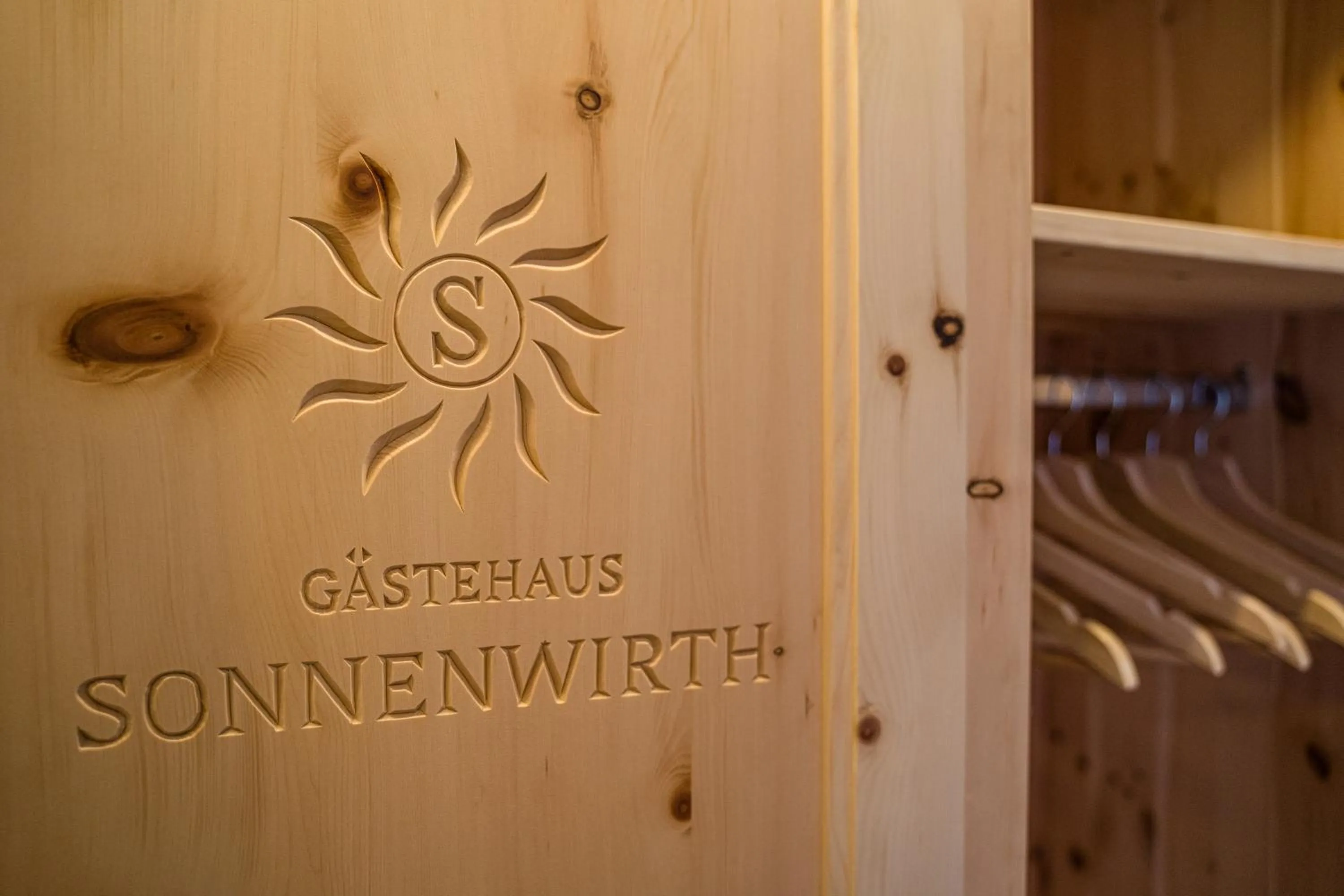 Property logo or sign in Gästehaus Sonnenwirth