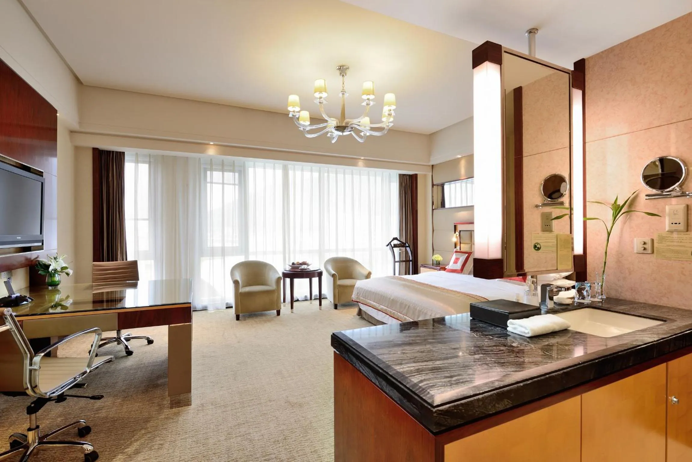 Photo of the whole room in Ramada Plaza By Wyndham Taian