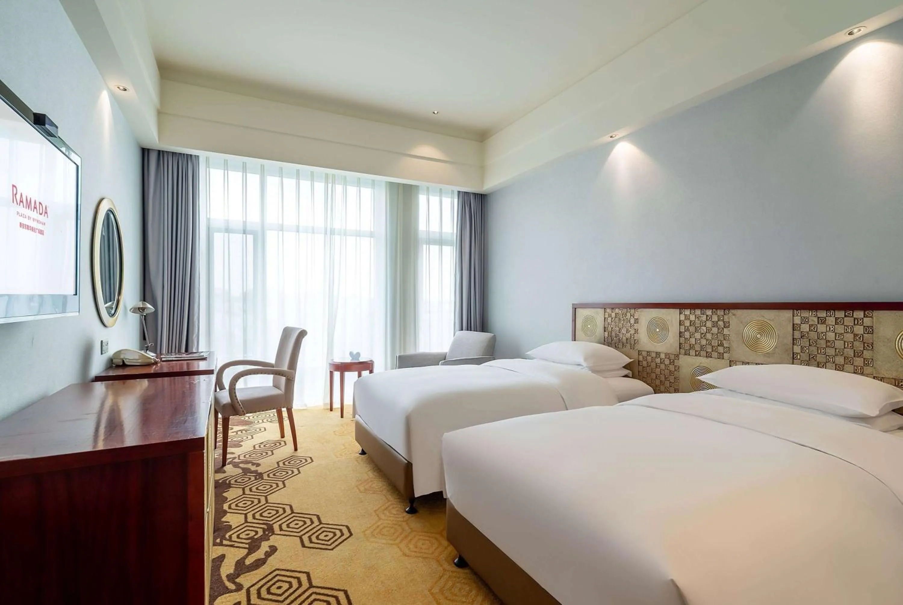 Photo of the whole room, Bed in Ramada Plaza By Wyndham Taian