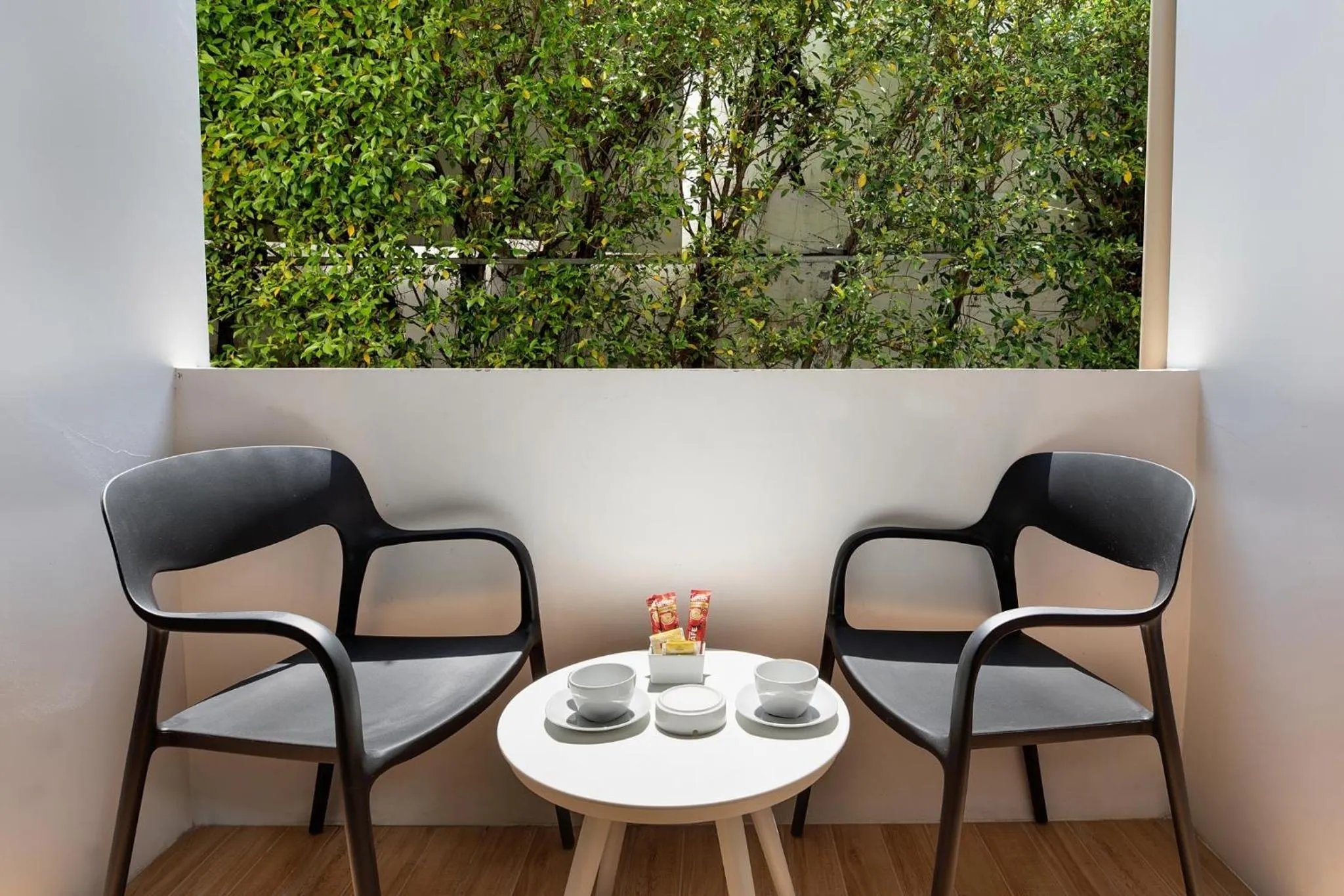 Seating area in The Bell Airport Phuket Hotel - SHA Extra Plus