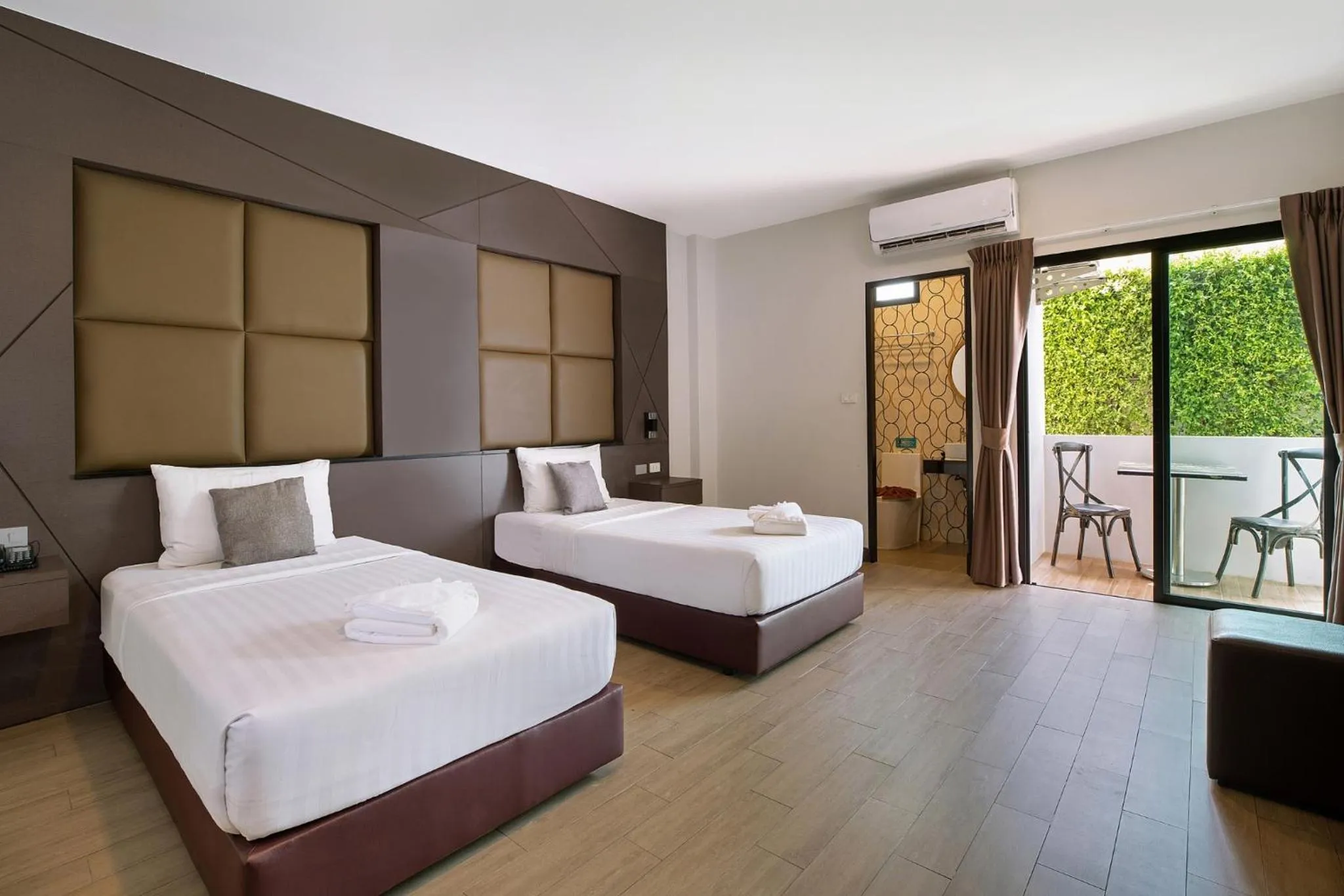 Bed in The Bell Airport Phuket Hotel - SHA Extra Plus