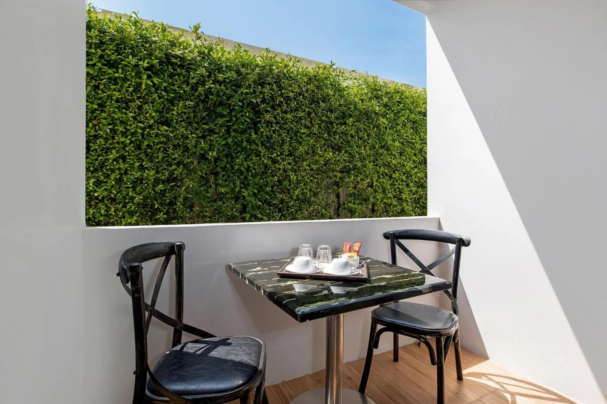 Seating area in The Bell Airport Phuket Hotel - SHA Extra Plus