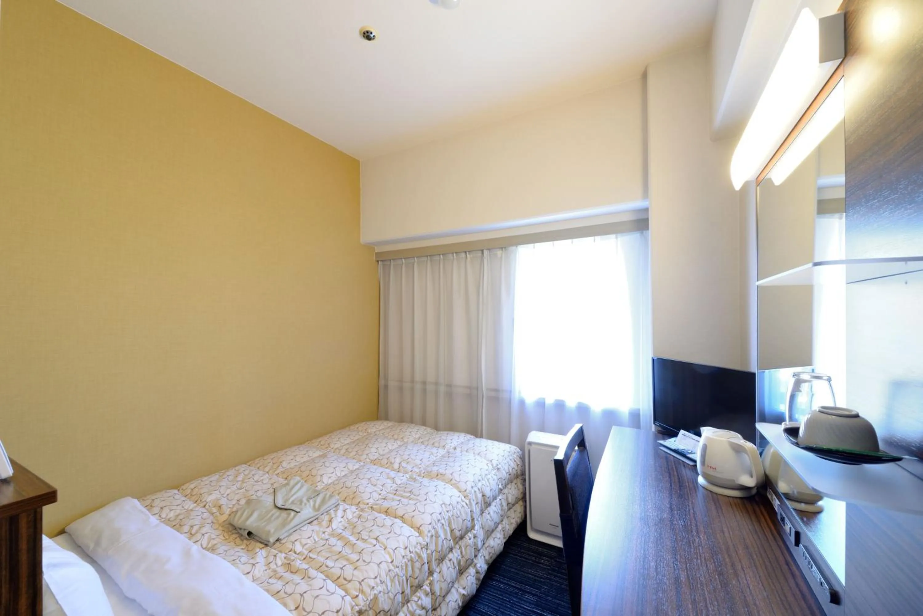 Photo of the whole room, Bed in Toyama Manten Hotel