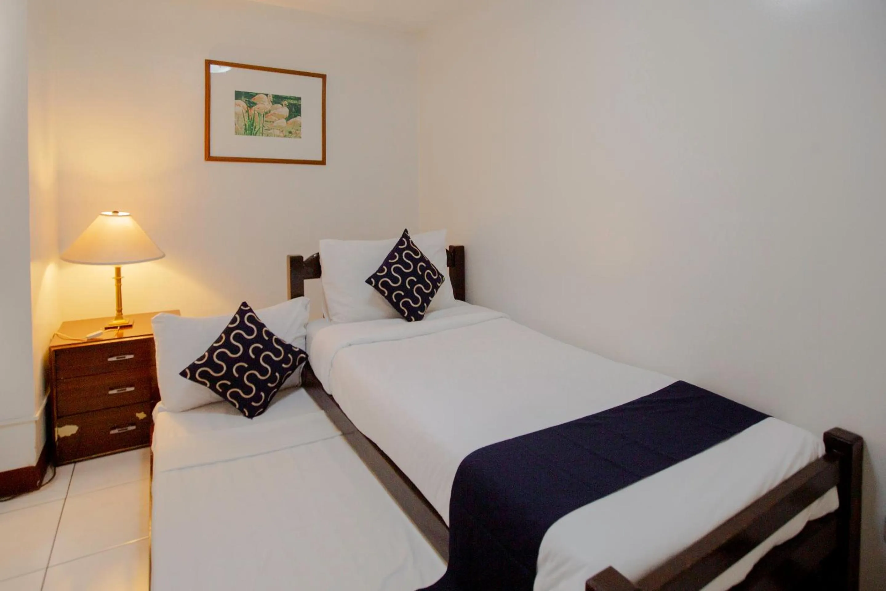 Photo of the whole room, Bed in Newgrange Condotel