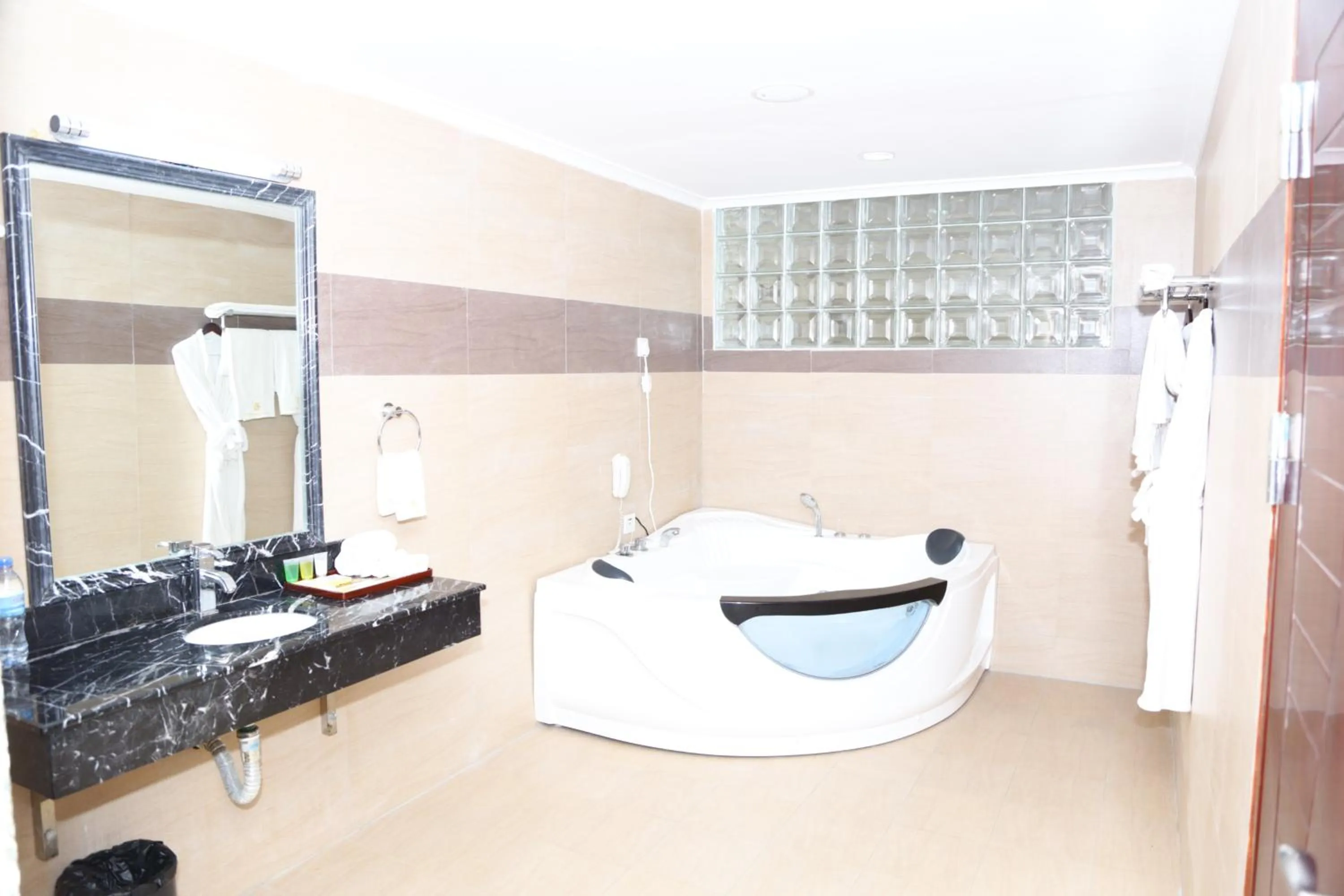 Bathroom in Tiffany Diamond Hotels Ltd - Indira Gandhi street