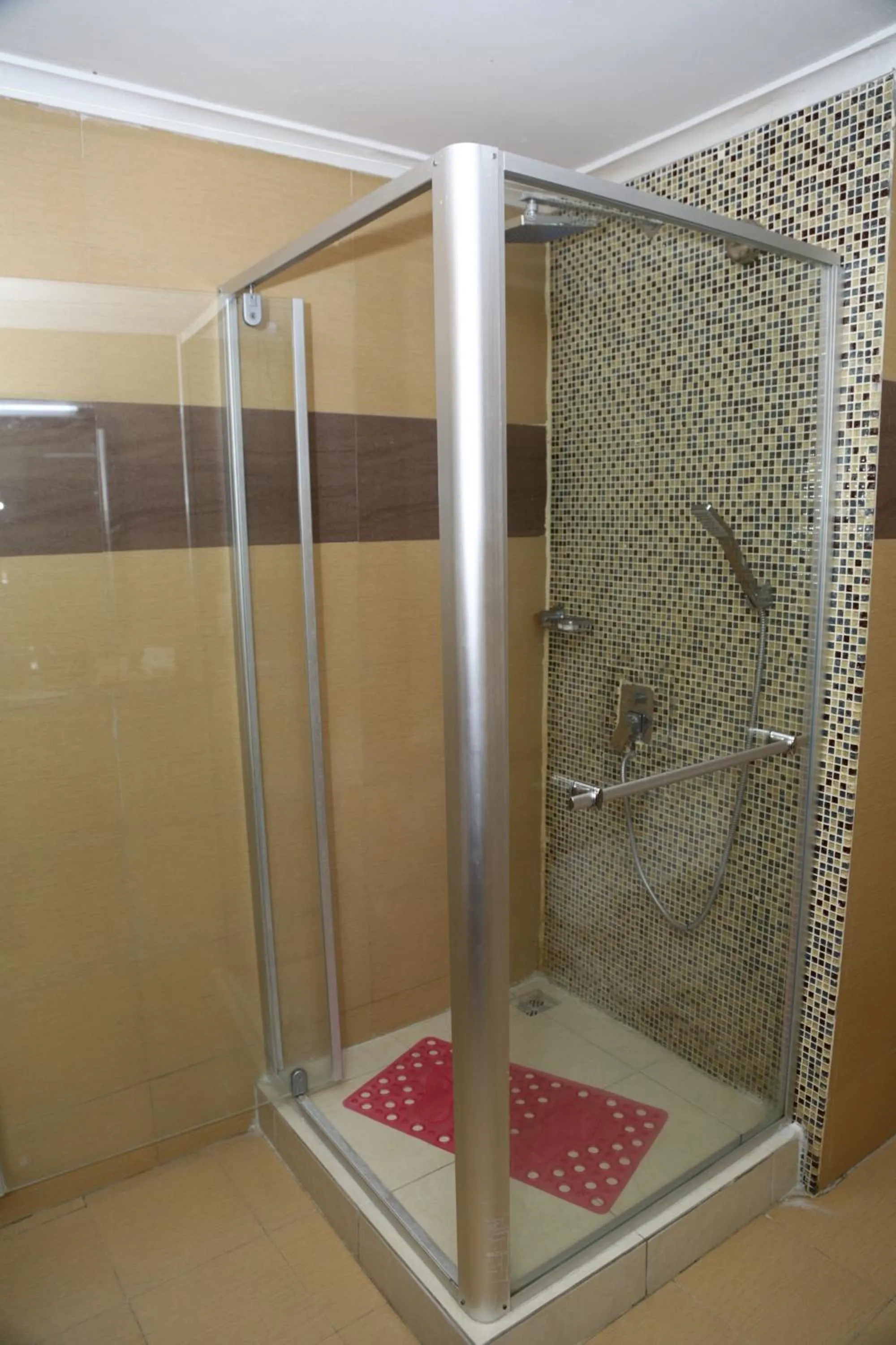 Shower in Tiffany Diamond Hotels Ltd - Indira Gandhi street