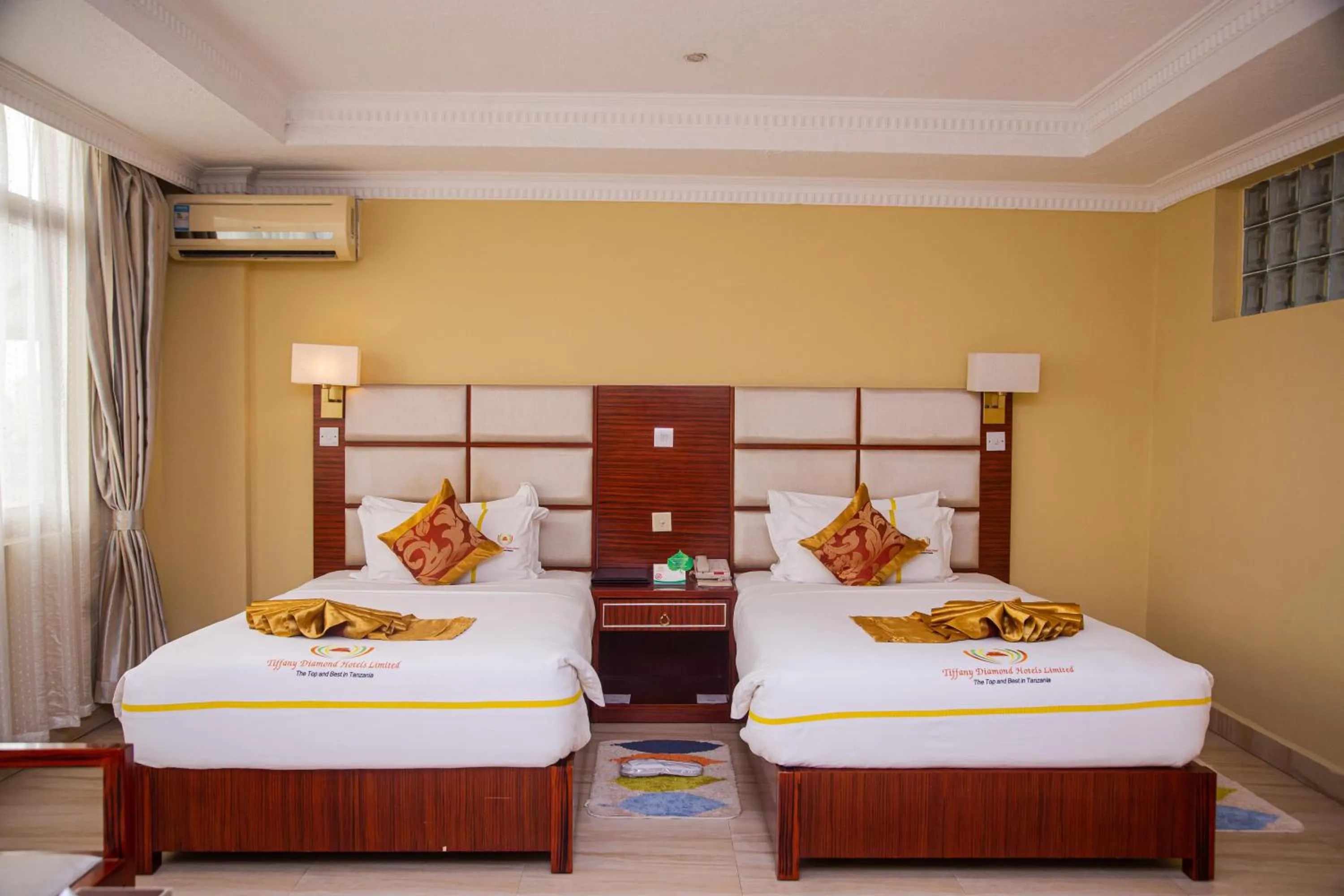 Bed in Tiffany Diamond Hotels Ltd - Indira Gandhi street