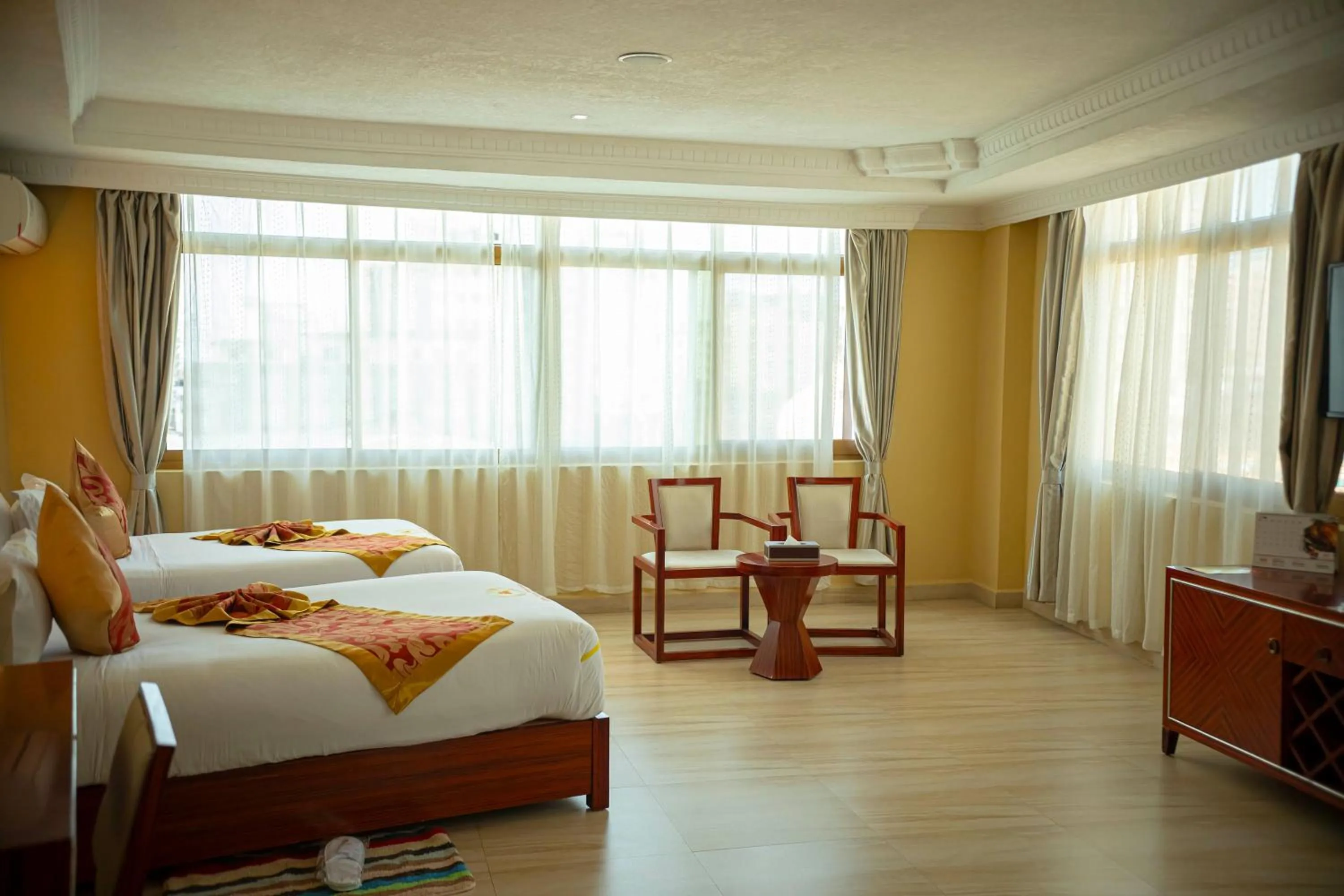 Photo of the whole room, Bed in Tiffany Diamond Hotels Ltd - Indira Gandhi street
