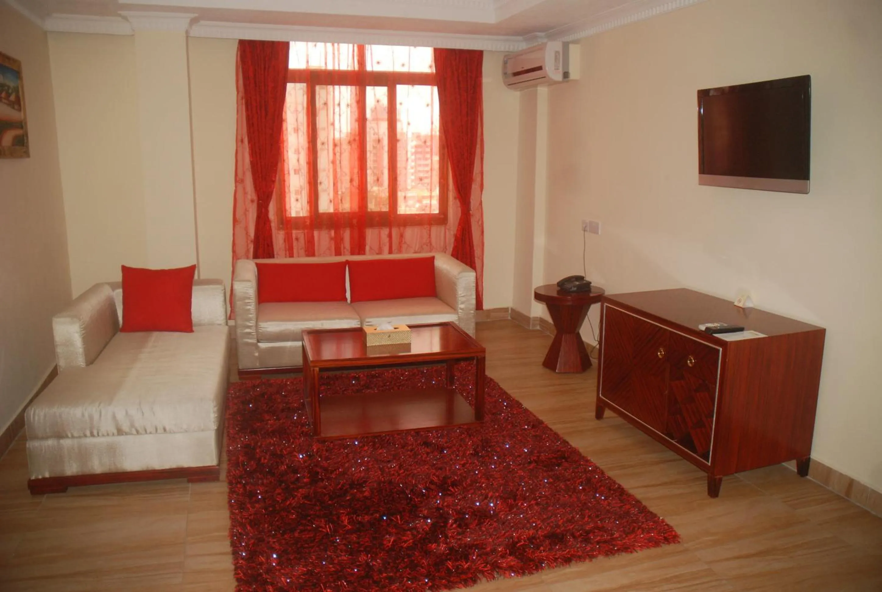 Seating area, Bed in Tiffany Diamond Hotels Ltd - Indira Gandhi street