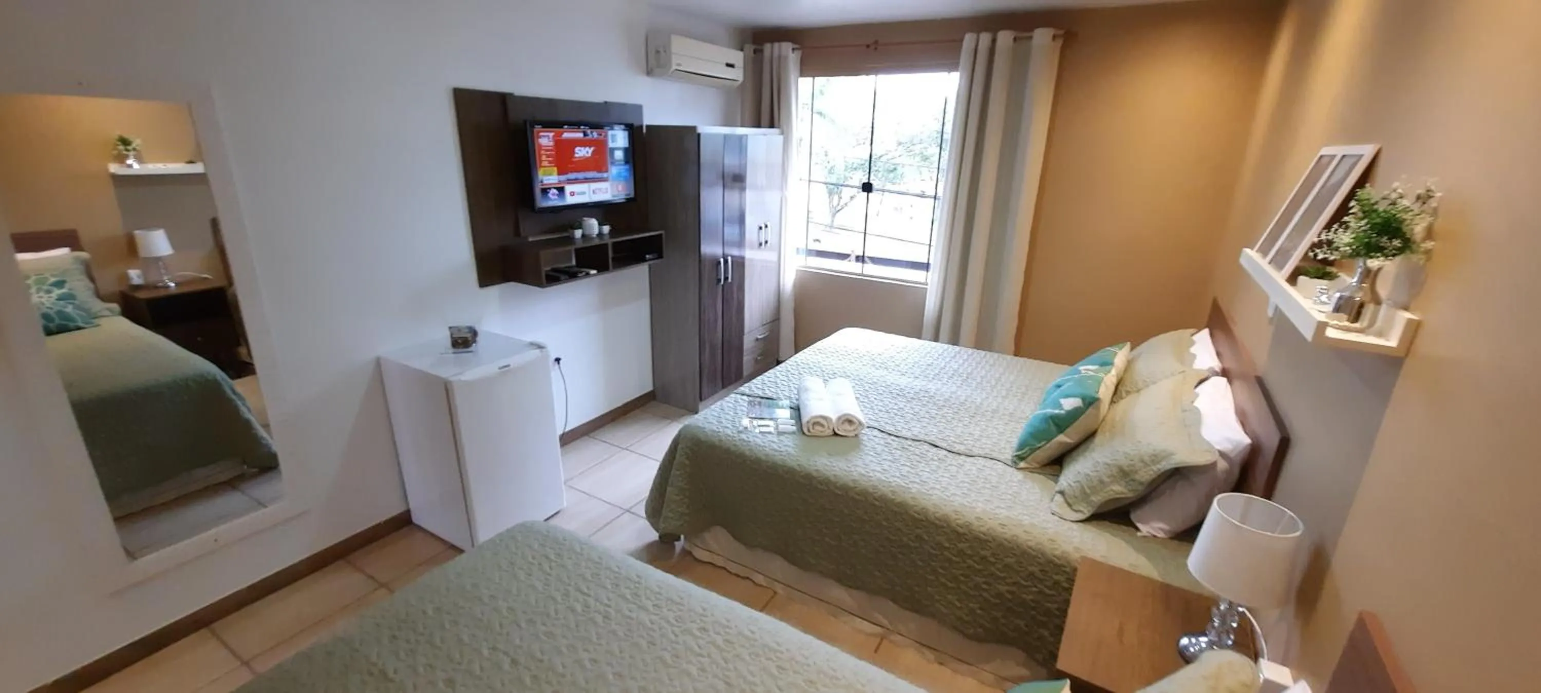 Photo of the whole room, Bed in Pousada Vó Celina