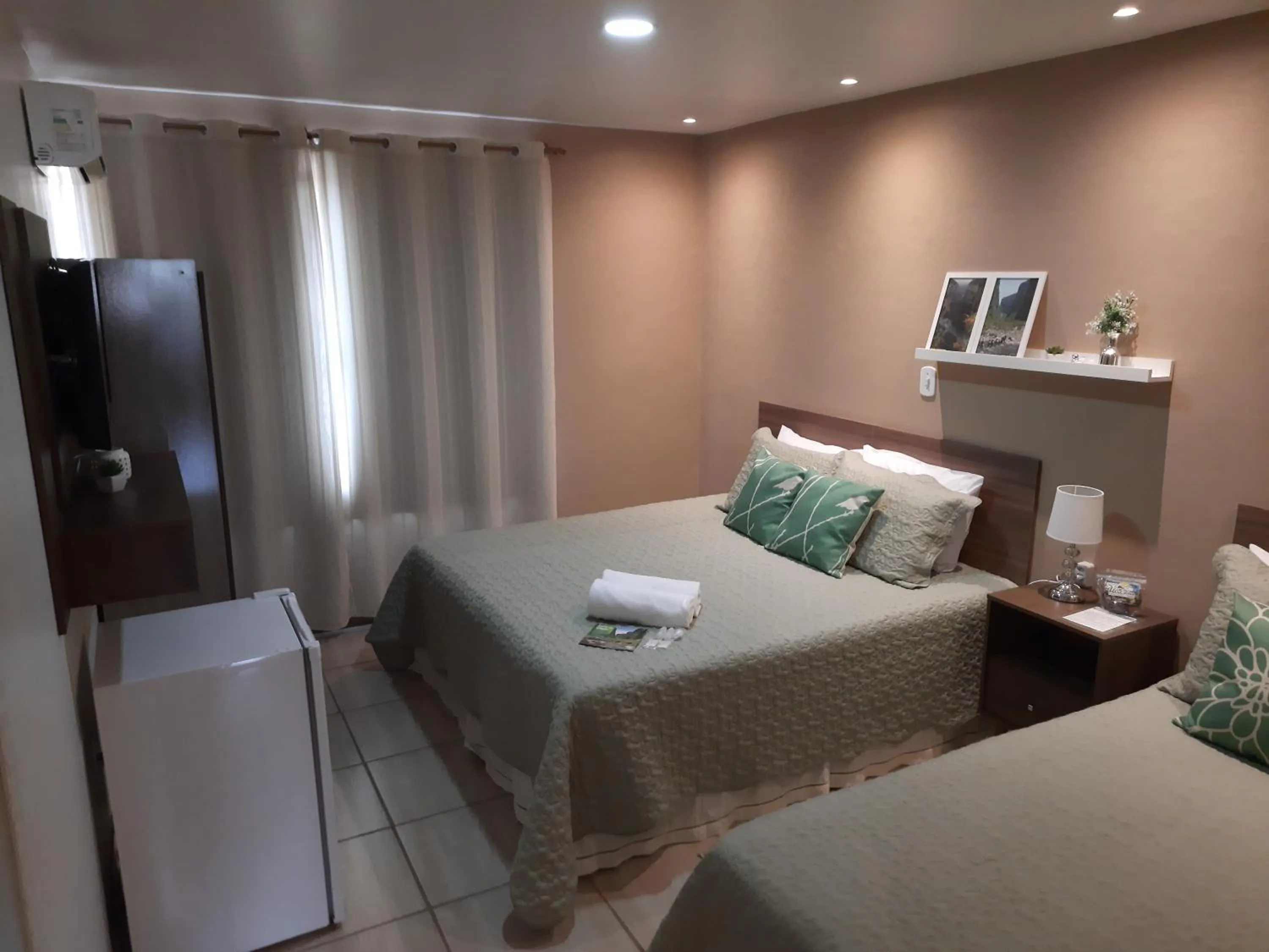 Bed in Pousada Vó Celina