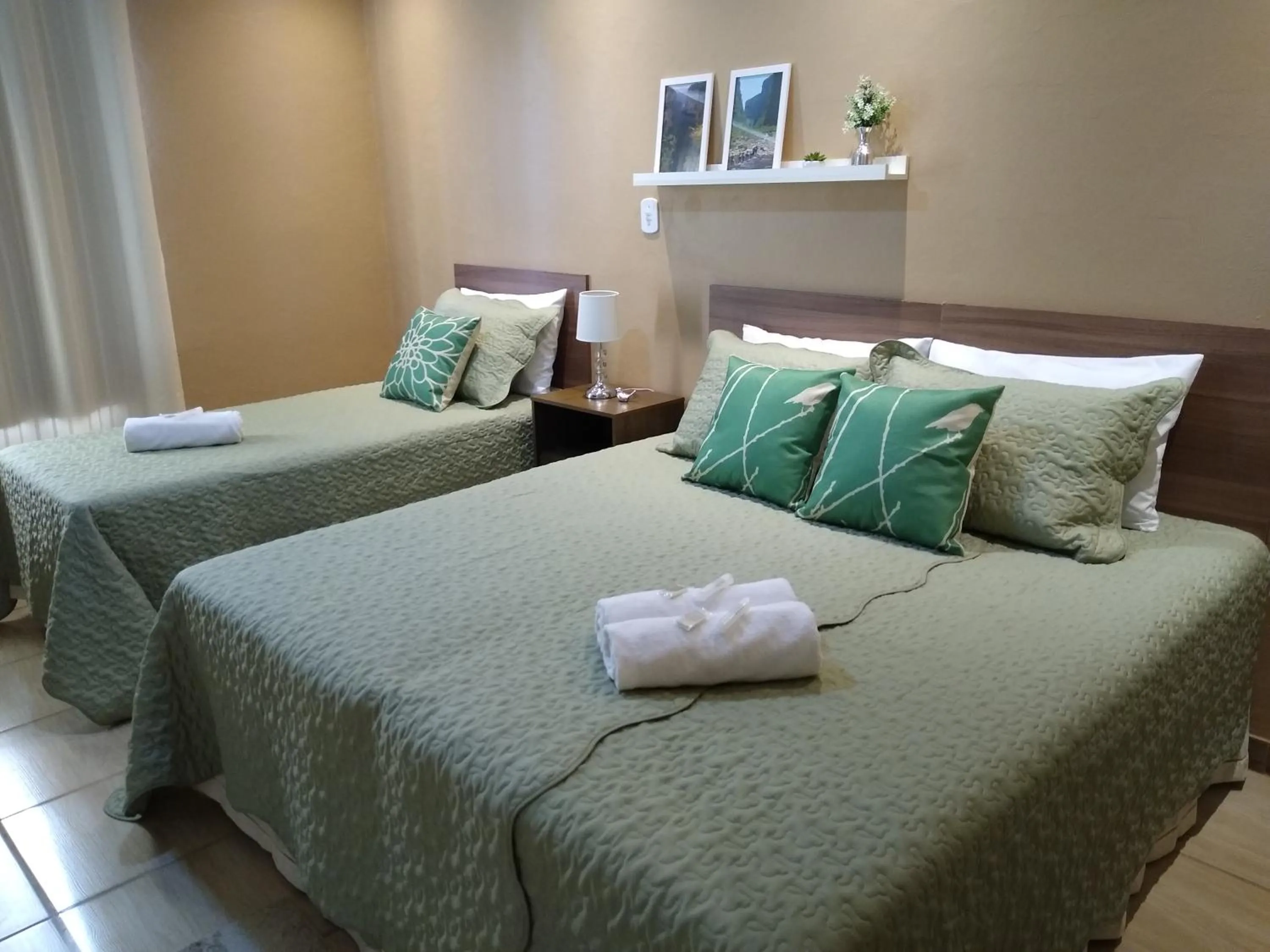 Bed in Pousada Vó Celina