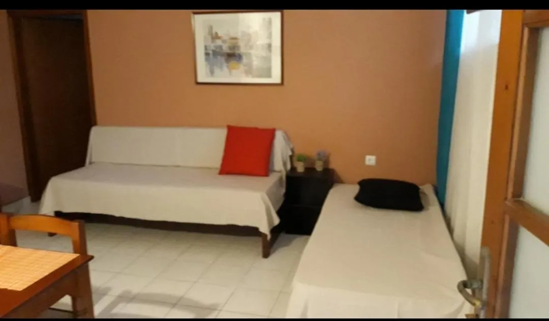 Living room, Bed in Alexandra Hotel