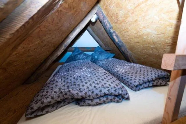 Bed in Heuhotel und Gästehaus Kohlstädt