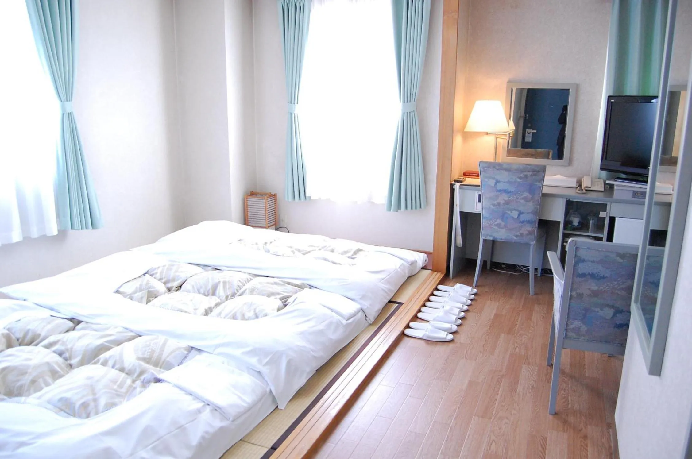Bed in Seagrande Shimizu Station Hotel