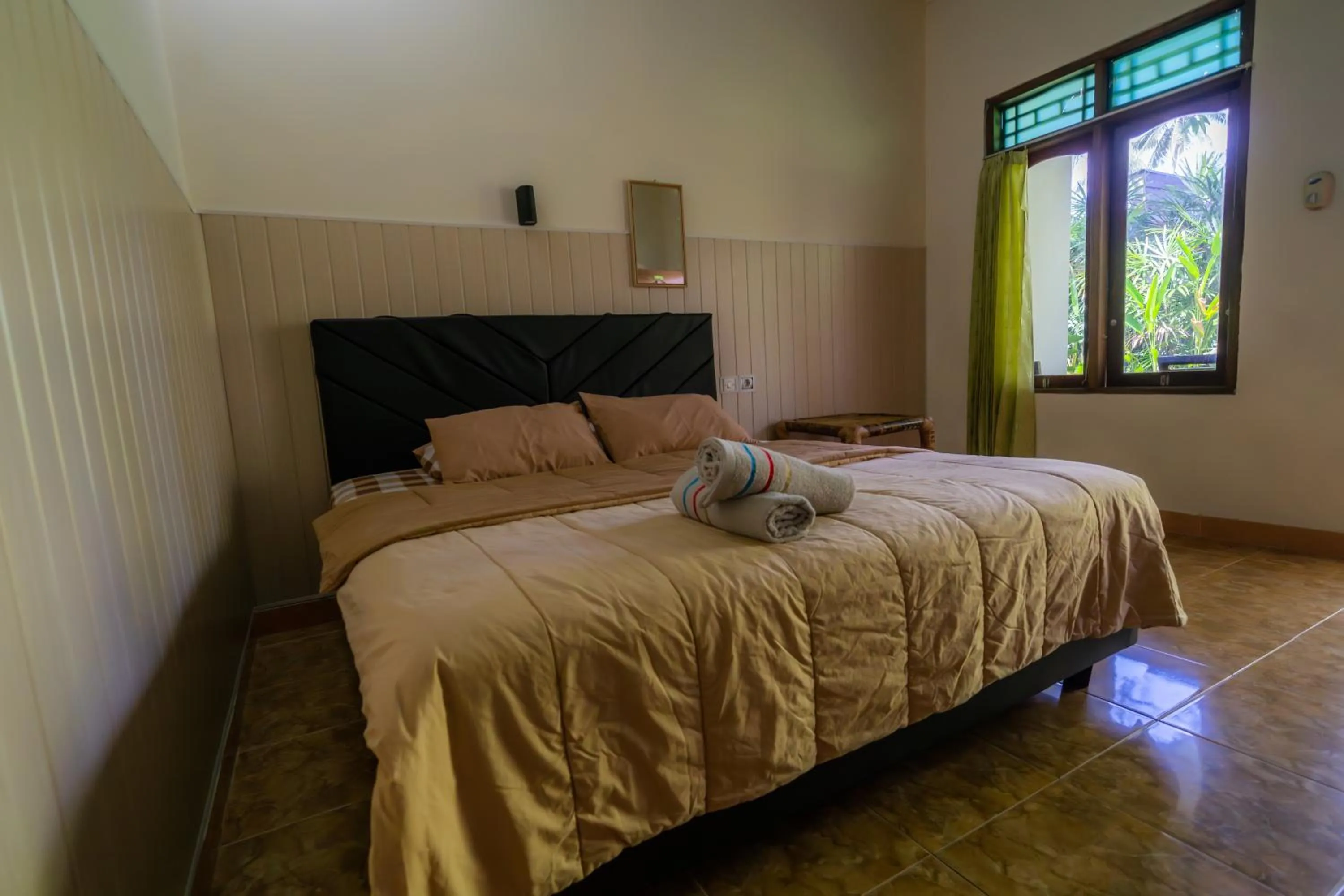 Bed in Family Garden Homestay